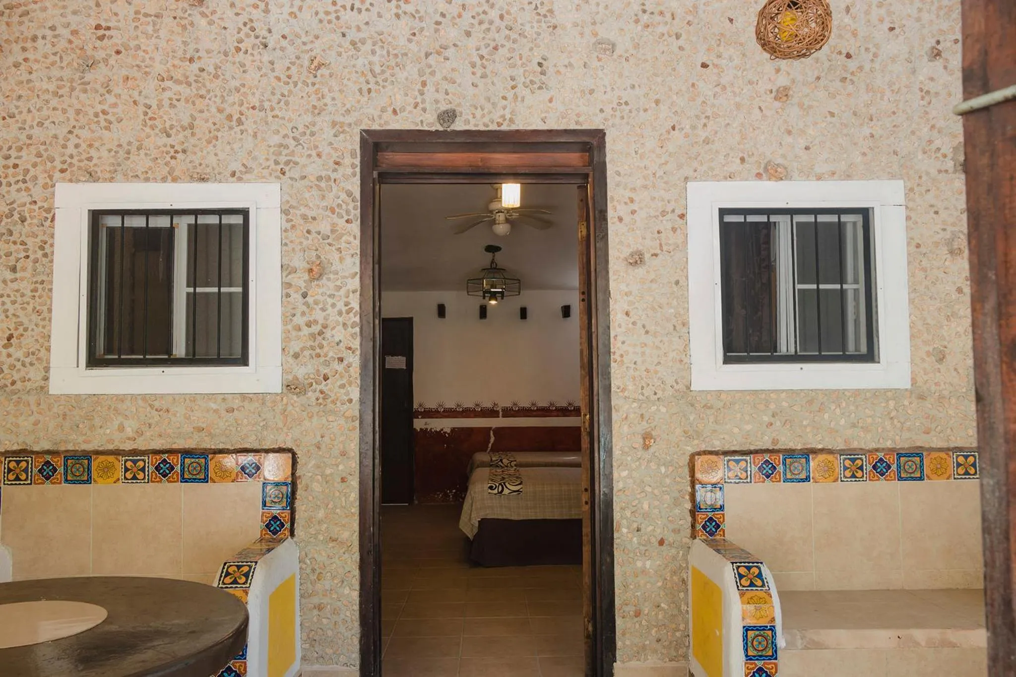 Patio in Antigua Lodge, 70 m from sandy beach