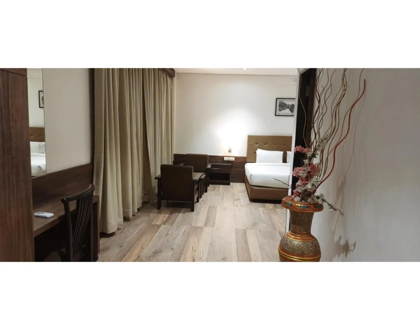 Photo of the whole room, Bed in The Byke Suraj Club, Junagadh