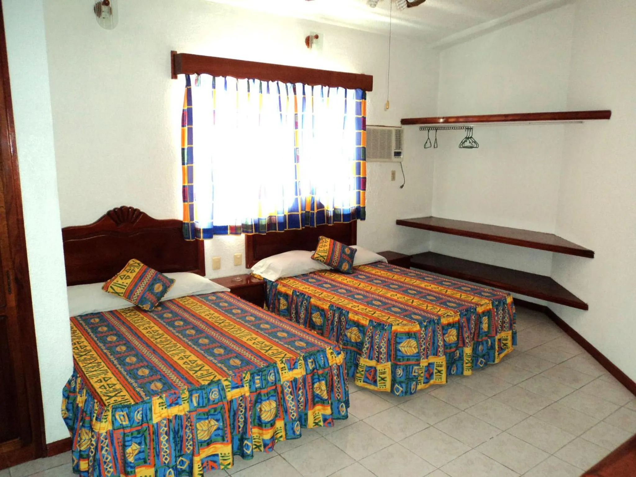Photo of the whole room, Bed in Canadian Resort Veracruz