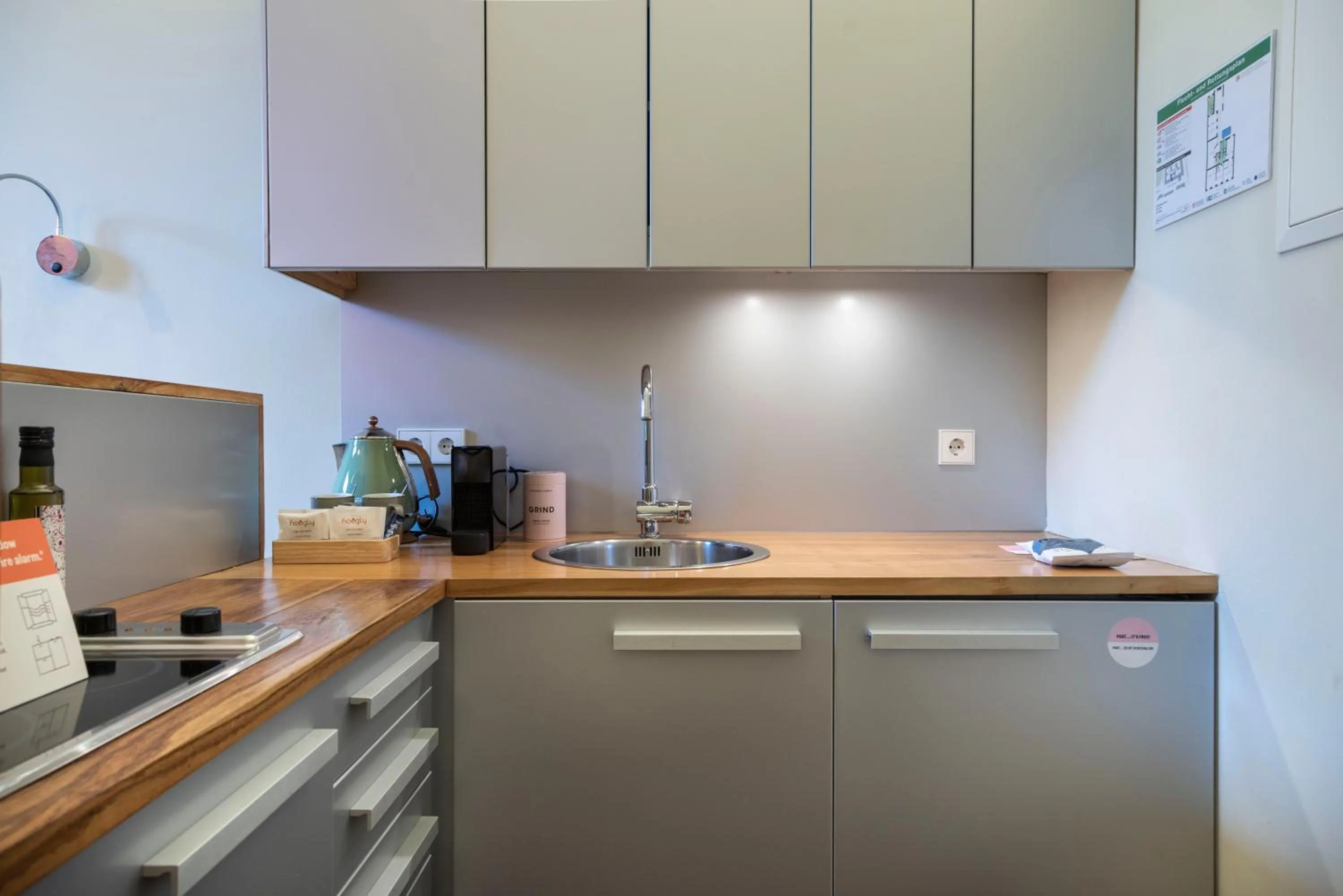 Kitchen or kitchenette in Numa Berlin Belfort