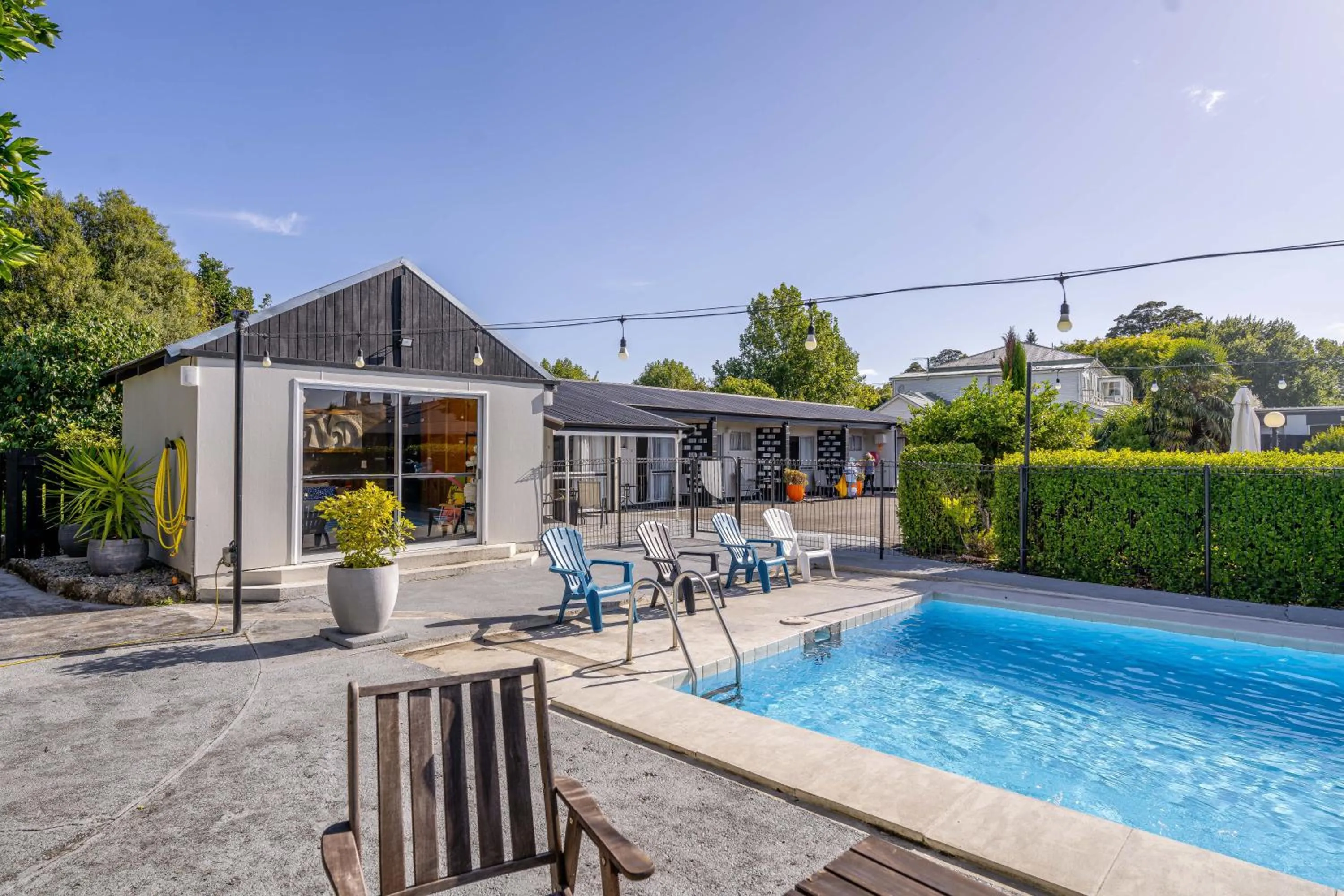 Swimming pool in Amble Inn Motel