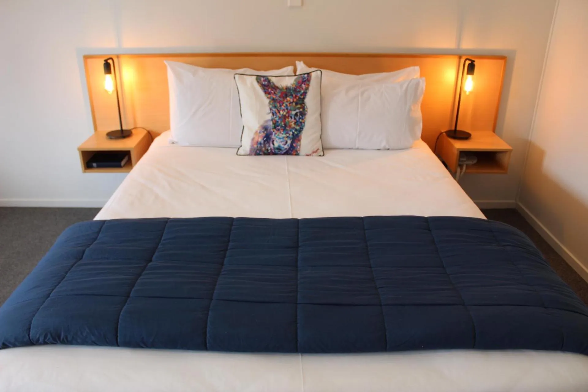 Bed in ASURE Kaimai View Motel