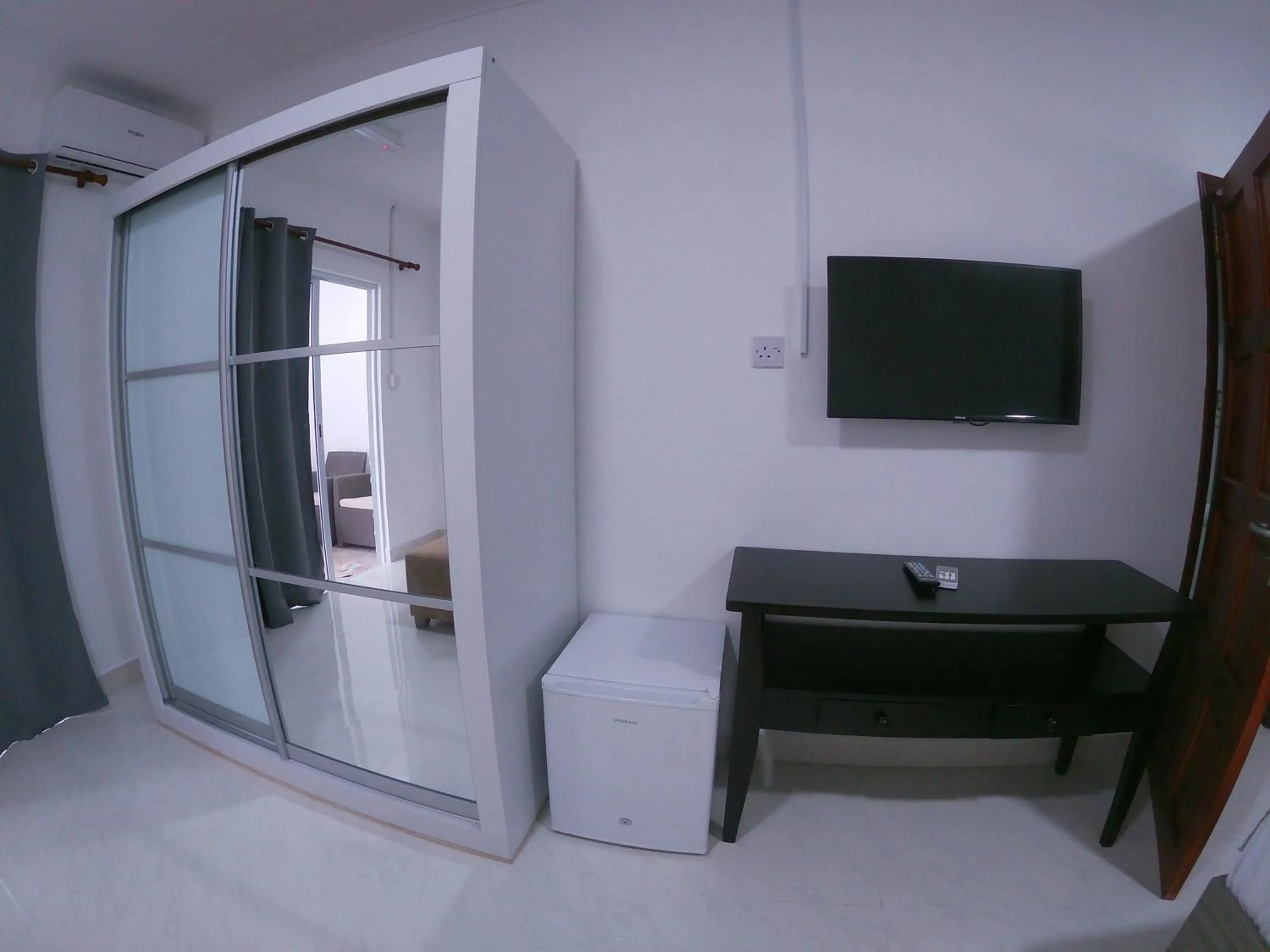 Communal lounge/ TV room in Hotel Plein Soleil