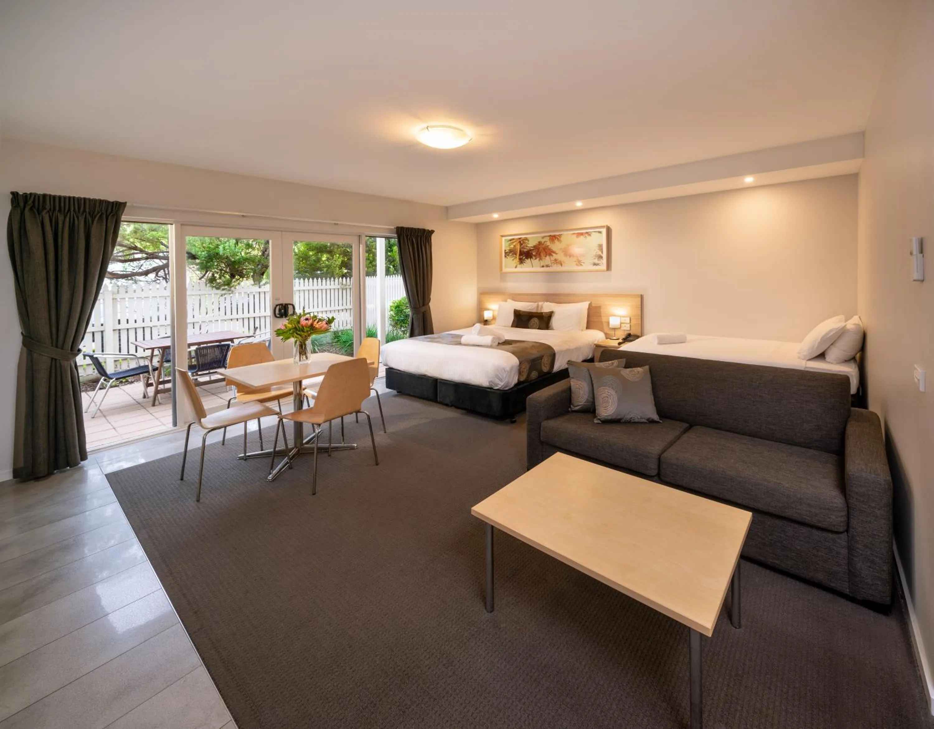 Bed in Boathouse Resort Studios and Suites