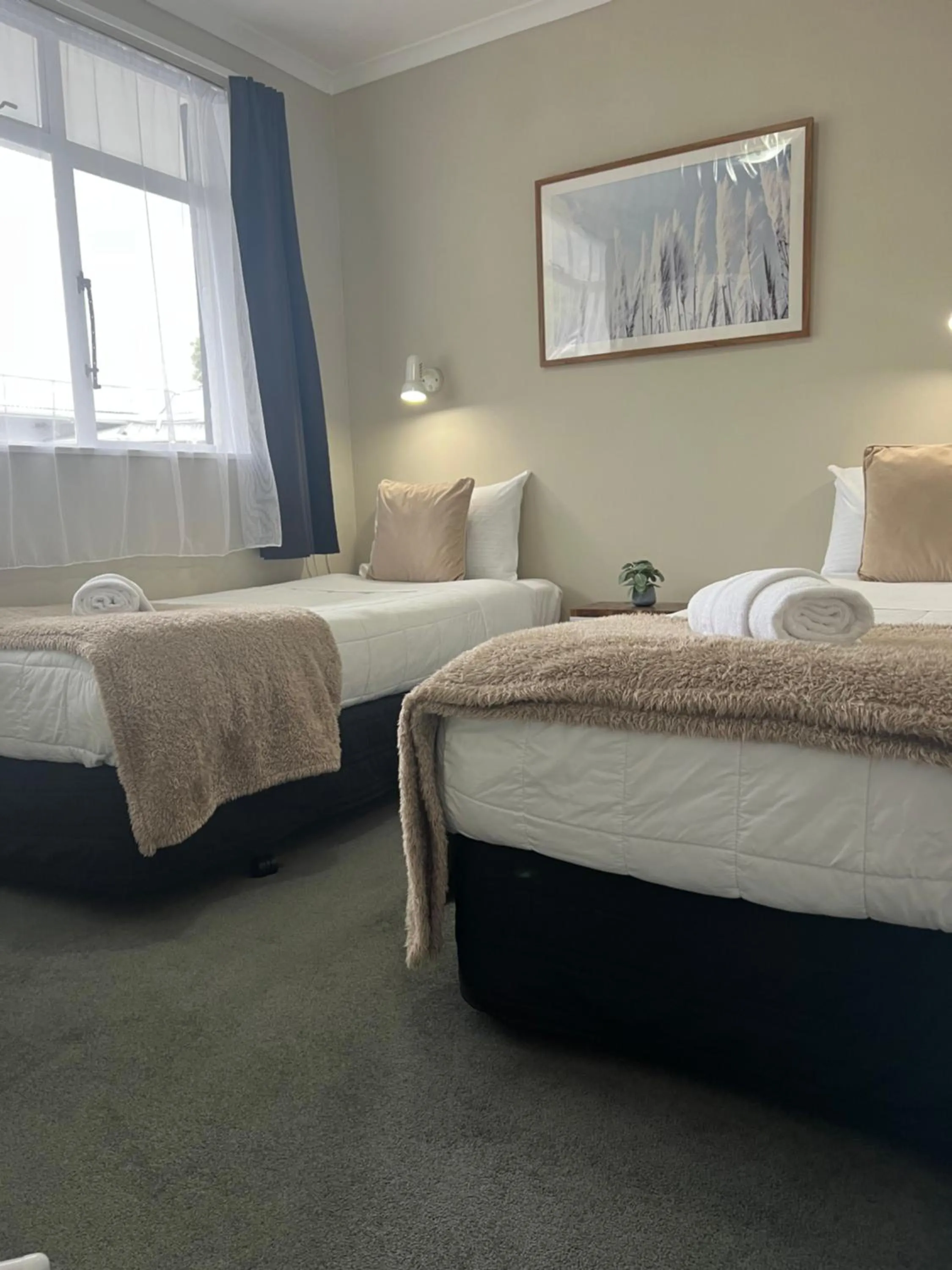 Bed in High Street Living Motel