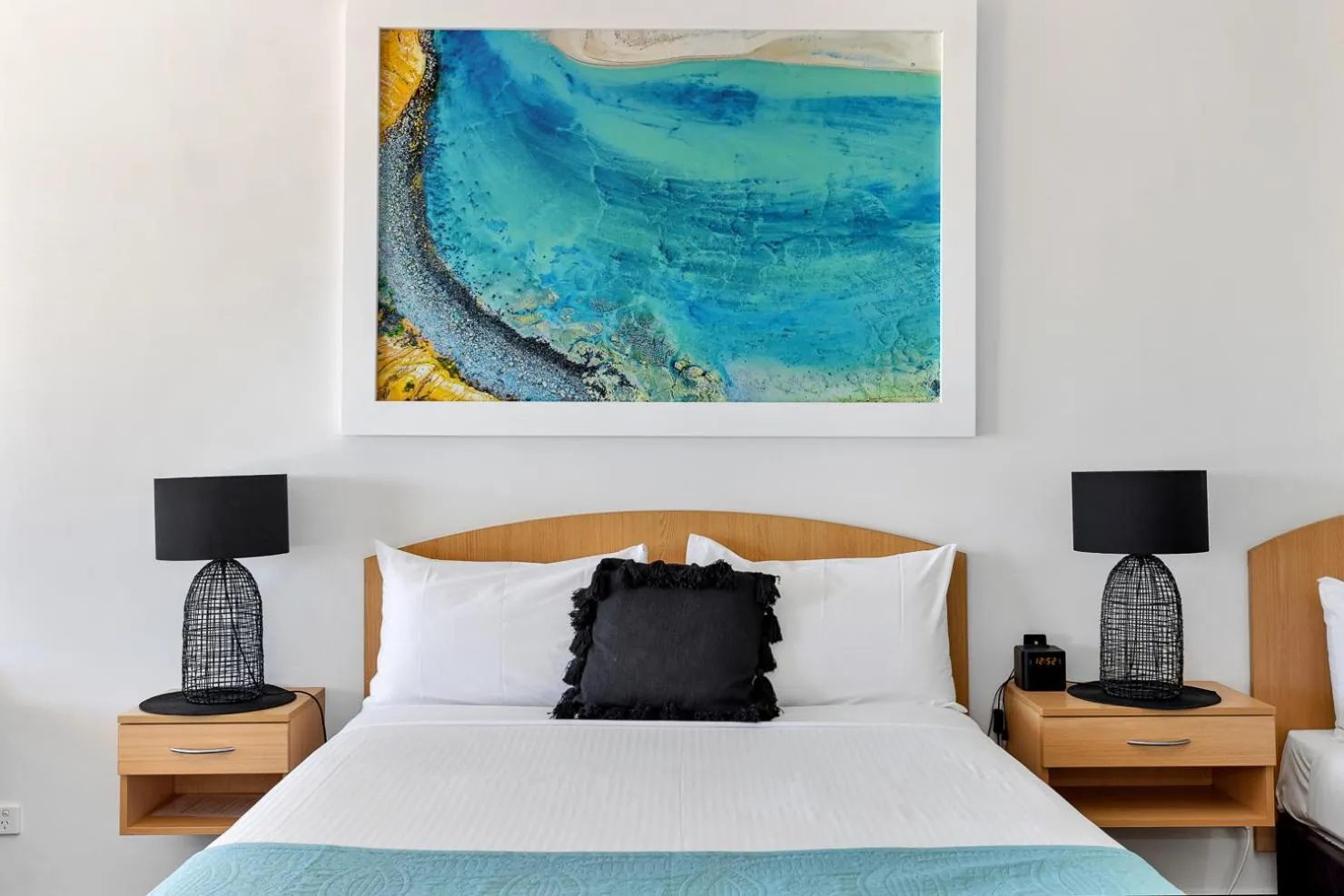 Bed in Coast Motel and Apartments