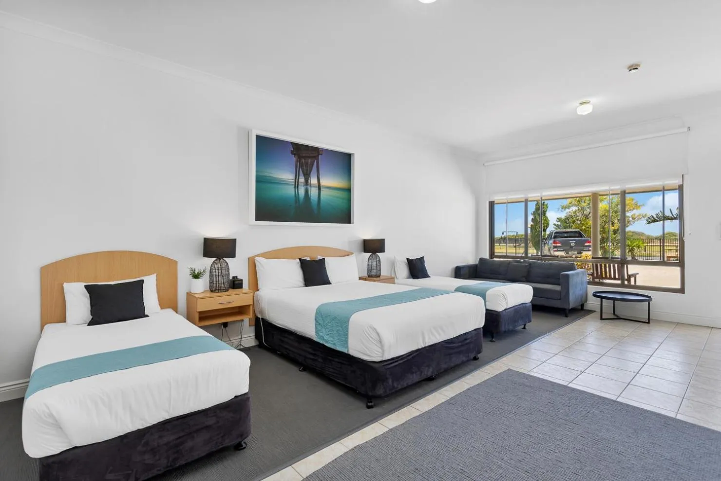 Bed in Coast Motel and Apartments