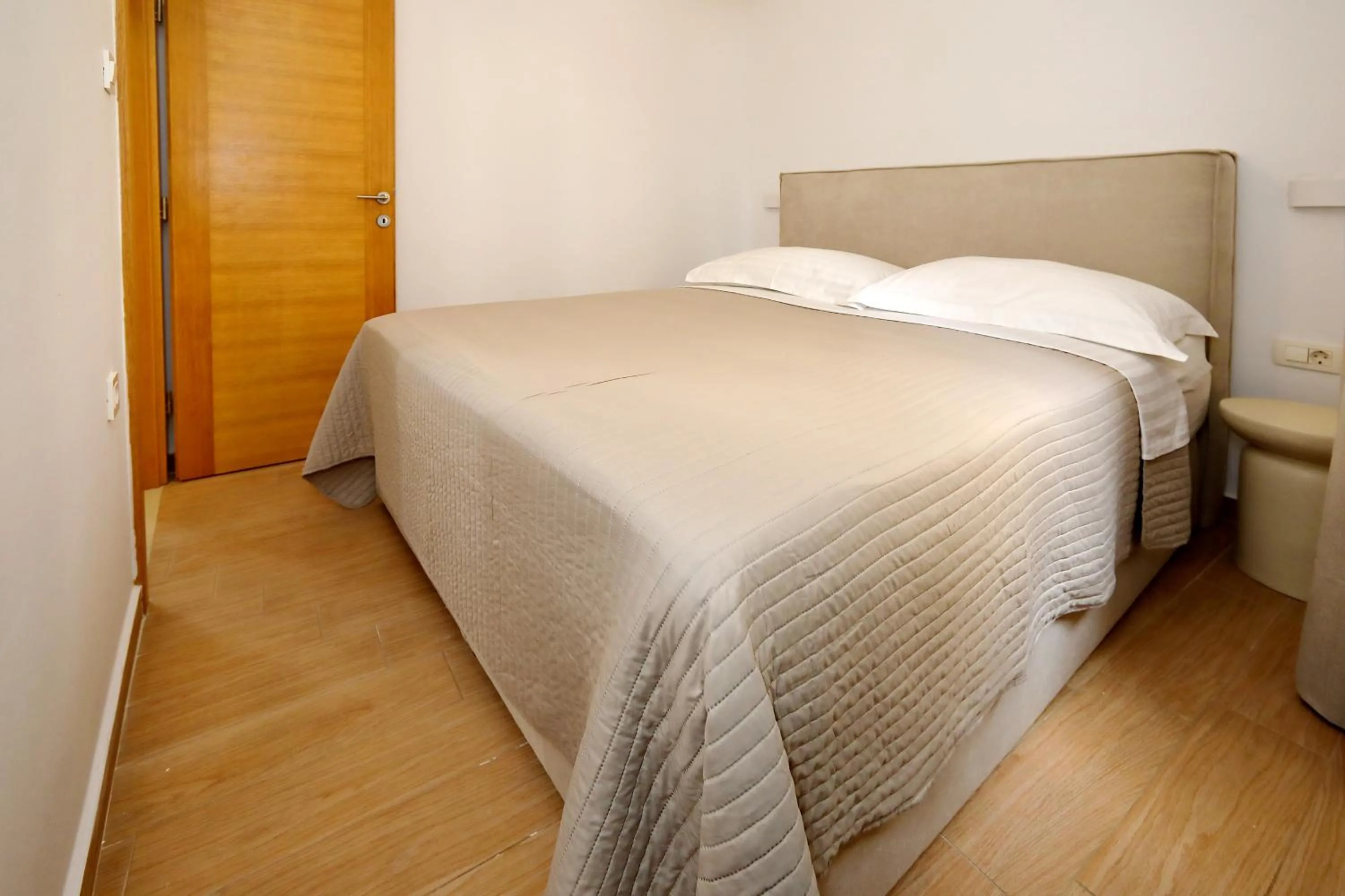 Bed in Apartments Nina