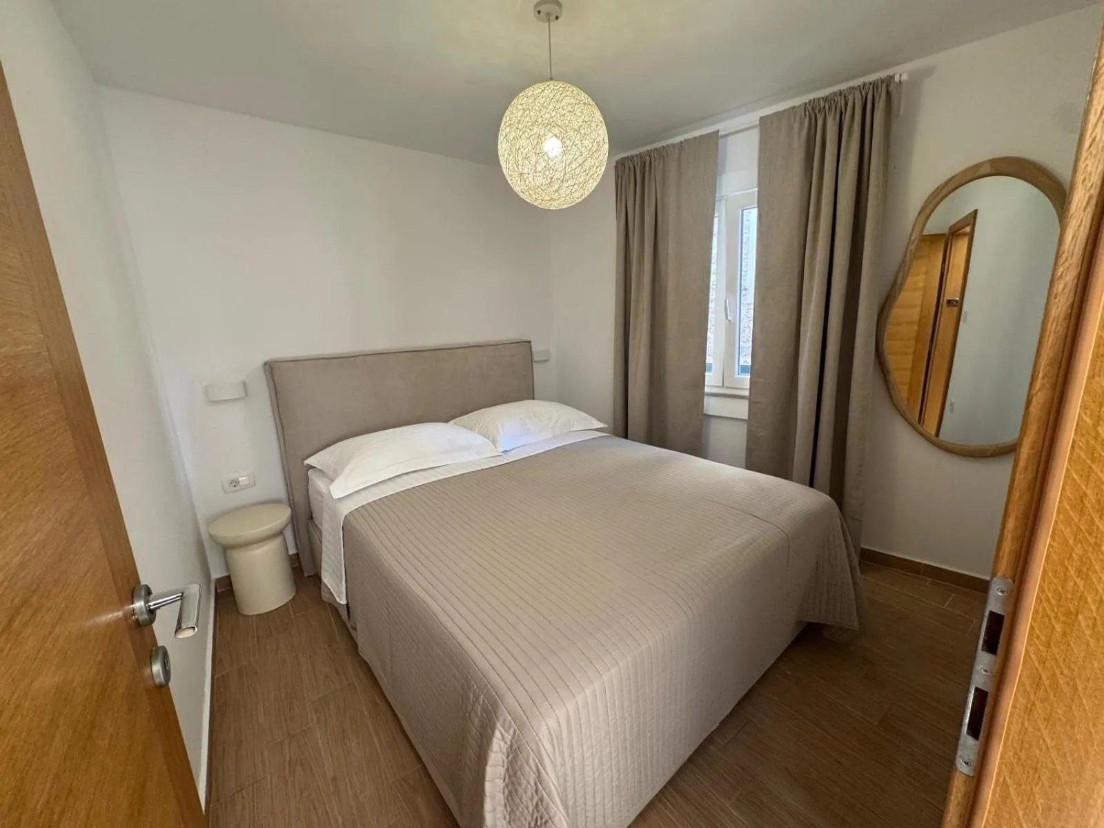 Bed in Apartments Nina