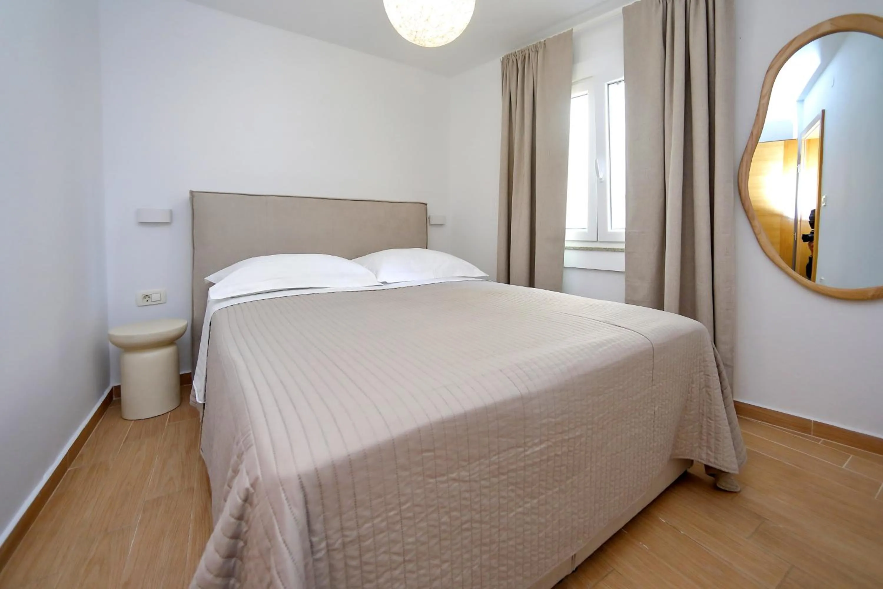 Bed in Apartments Nina