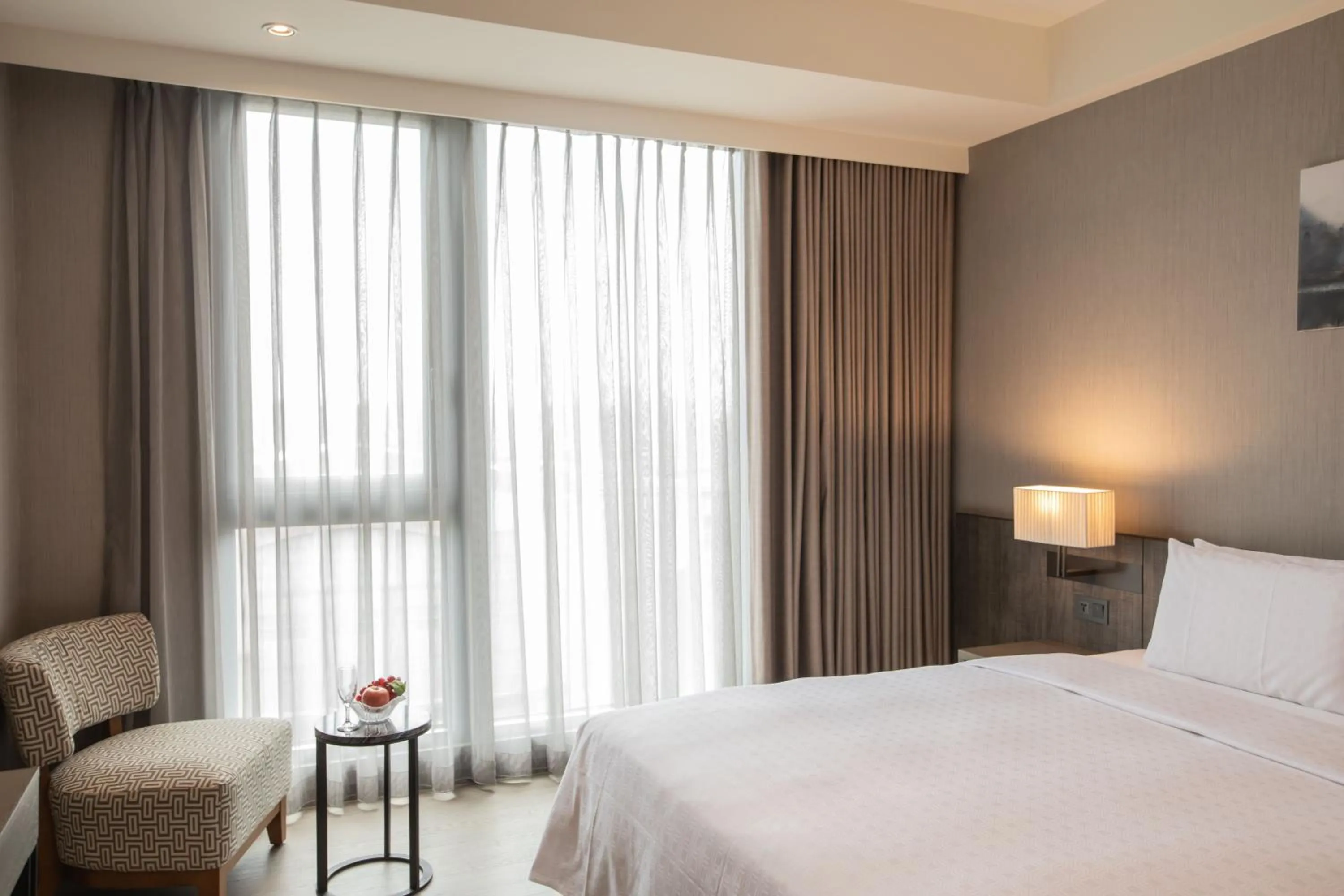 Bed in Jin Shi Hu Hotel