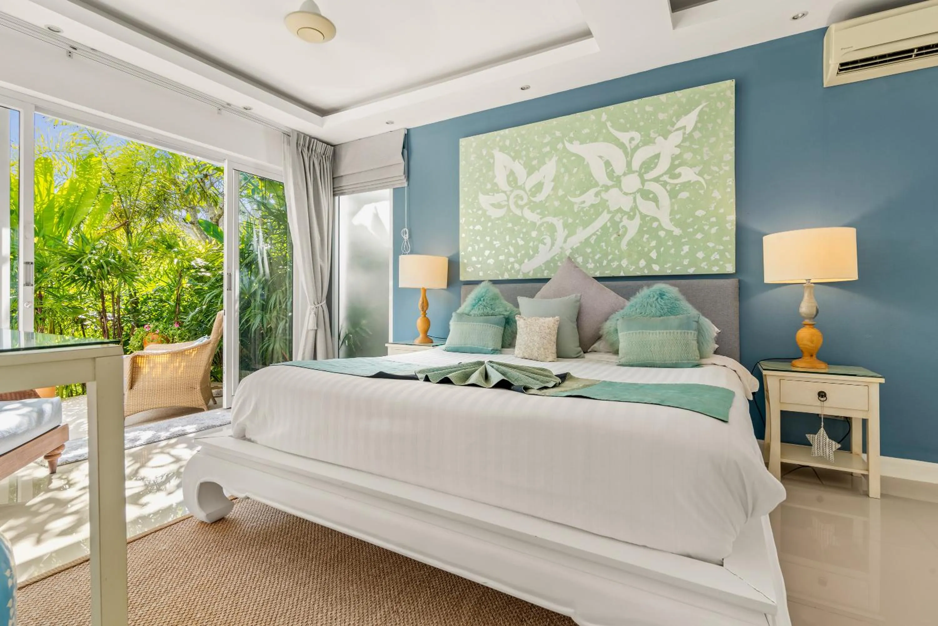 Bed in Beachfront Villa Baan Rim Haad 3BR