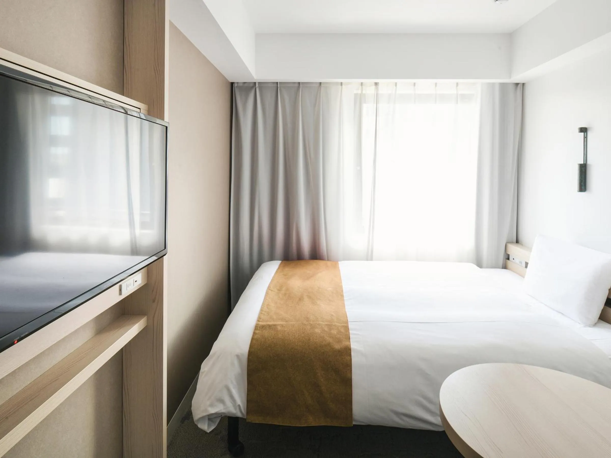 Bed in REF Kumamoto by VESSEL HOTELS