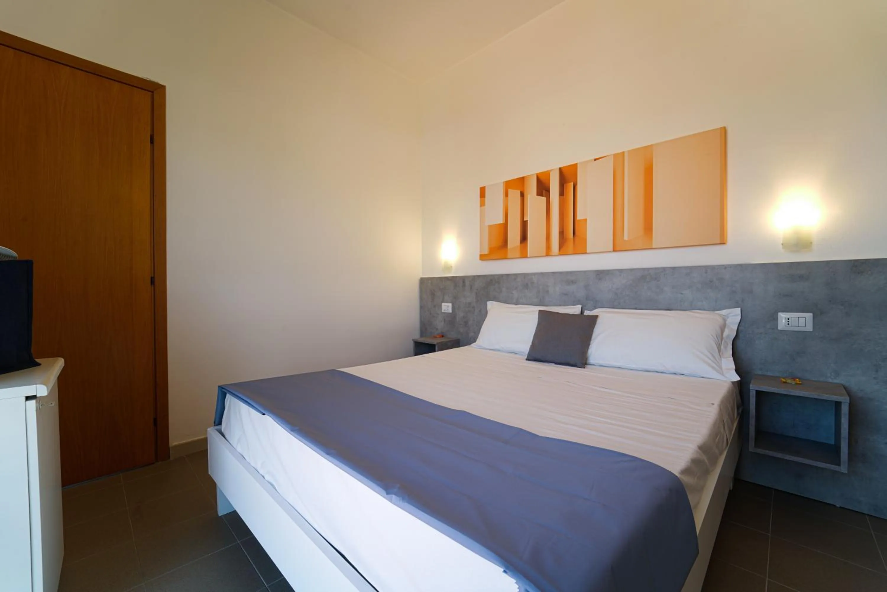 Bed in Hotel Rivabella