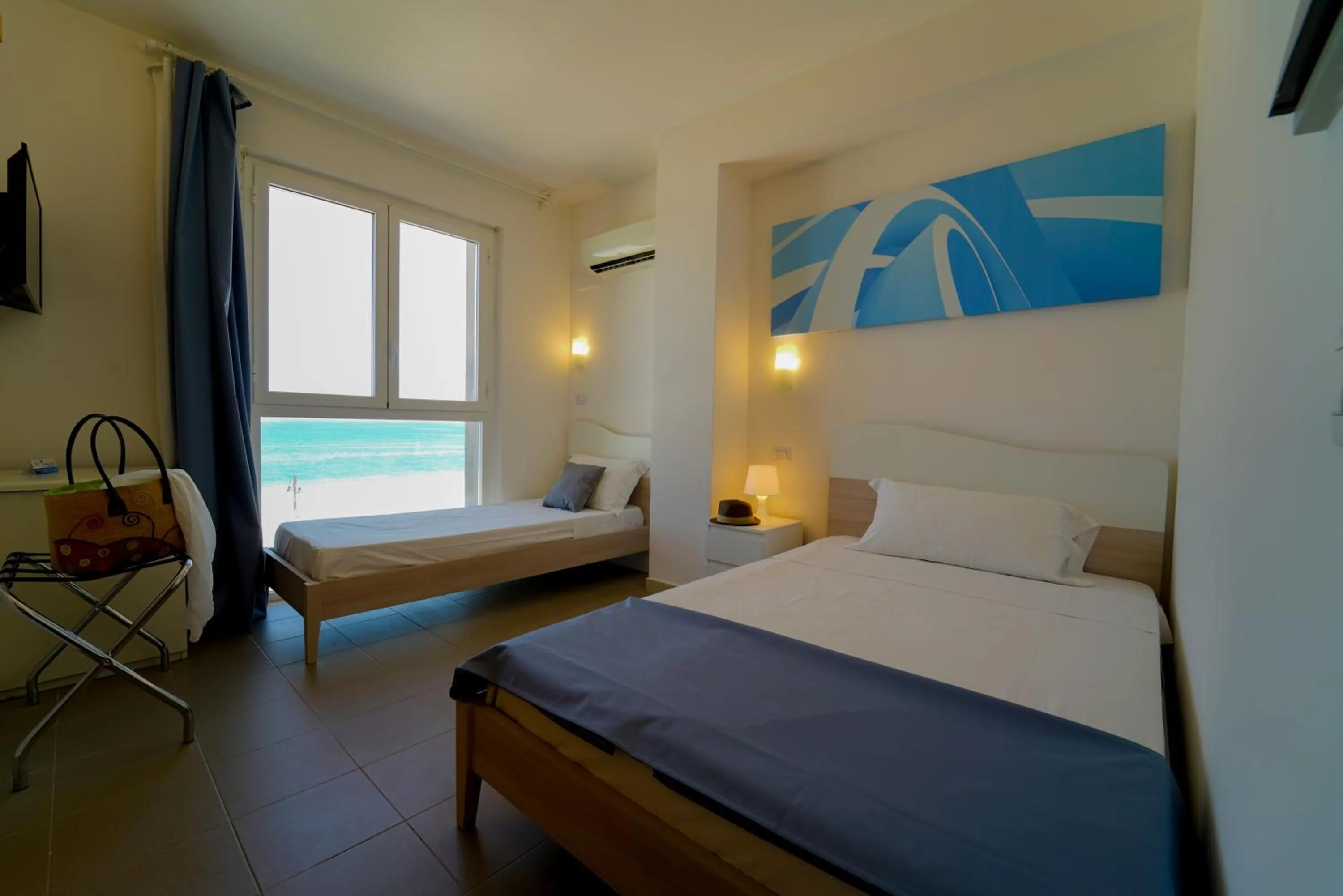 Bed in Hotel Rivabella