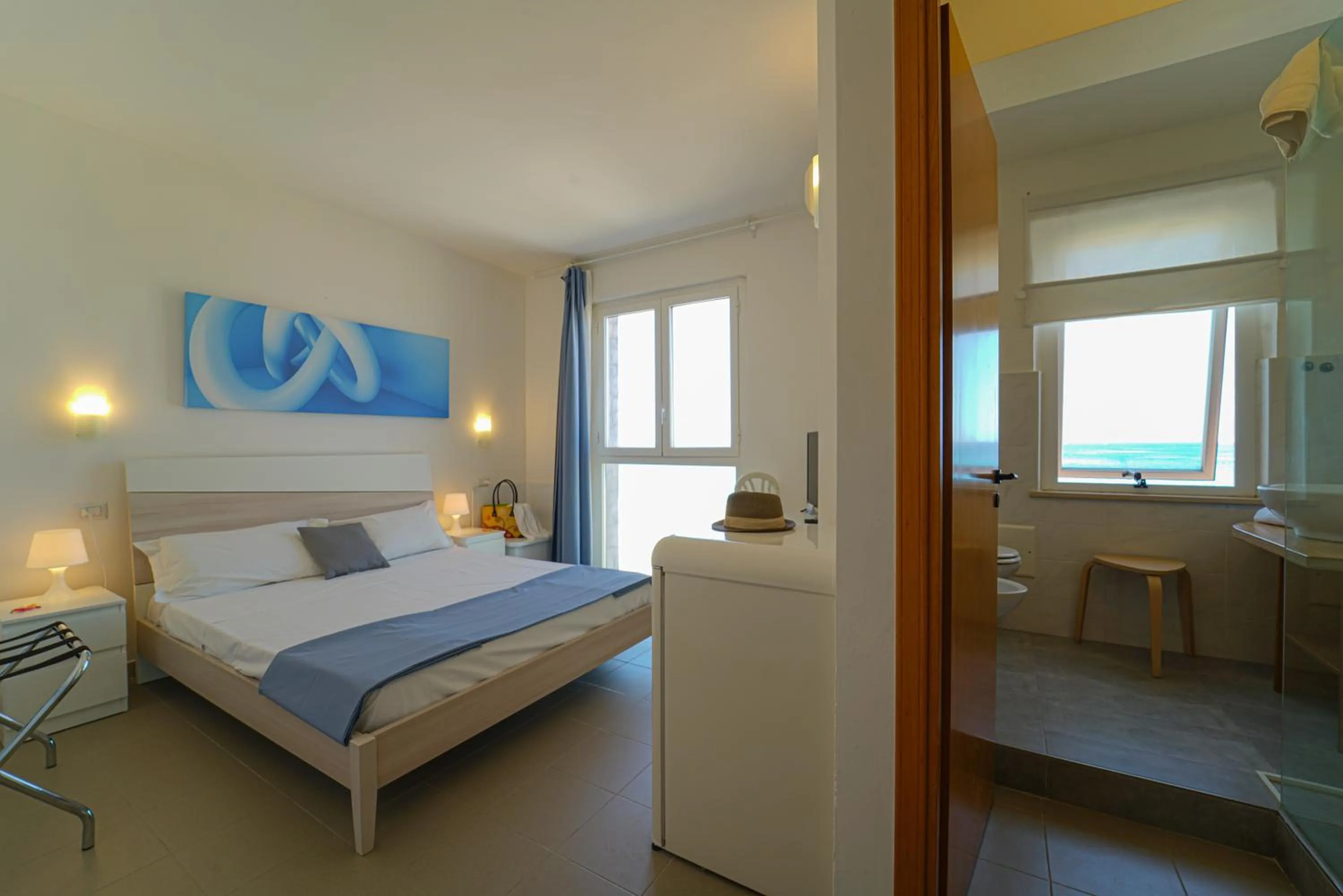 Bed in Hotel Rivabella