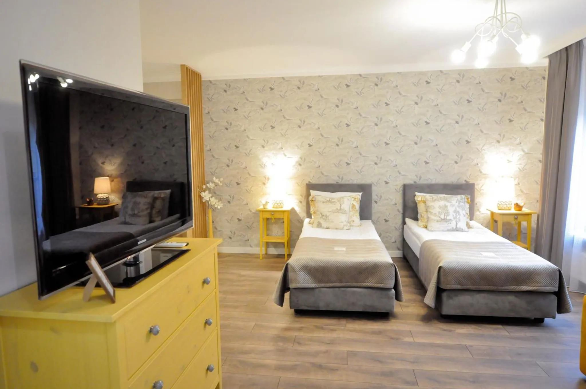 Communal lounge/ TV room, Bed in Piotrkowska 89 Residence