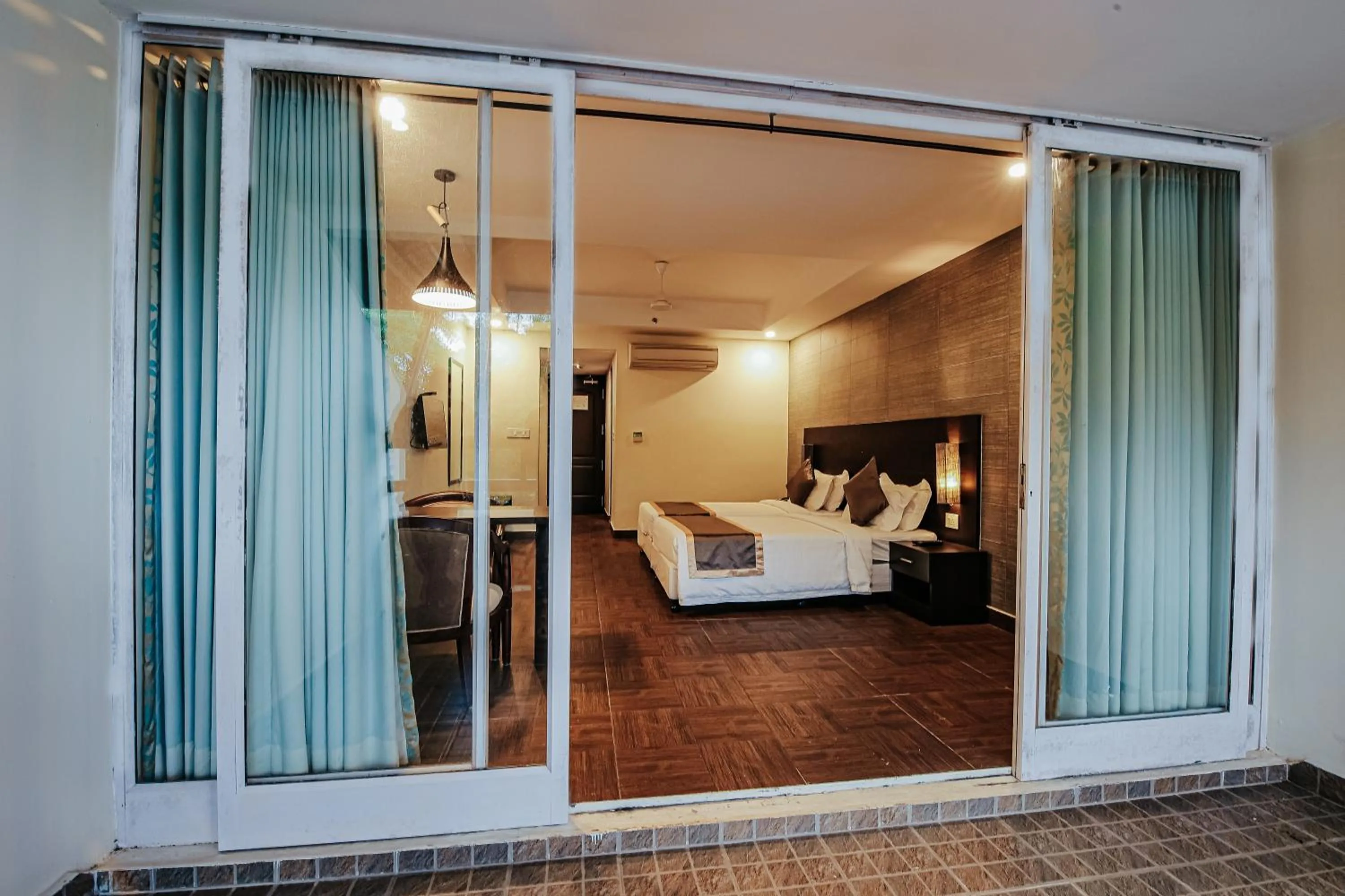 Balcony/Terrace, Bed in Avoki Resorts