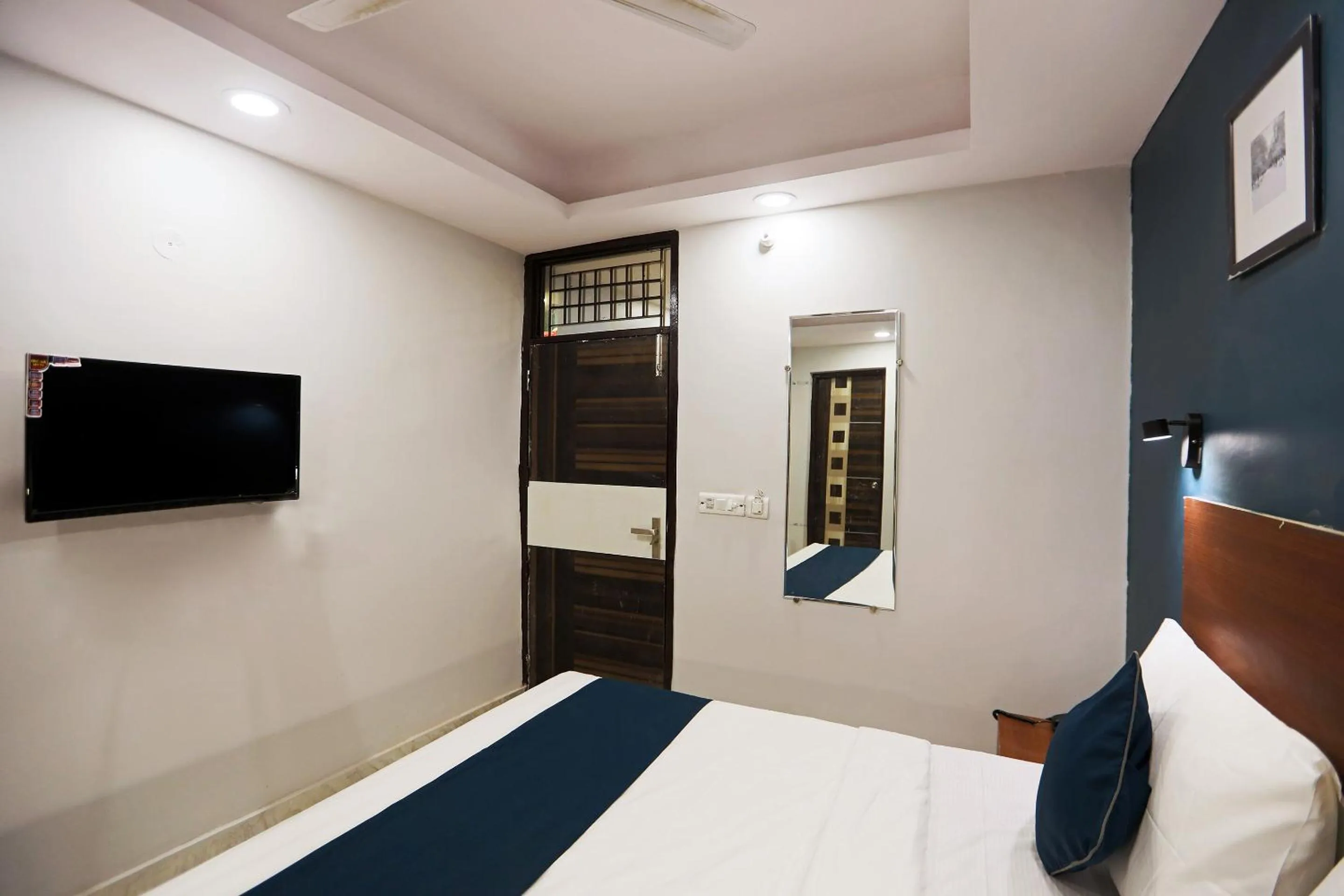 Bedroom, Bed in Super HOTEL SILVERKEY NEAR LIC BUILDING MAIN RD KHODA NEXT TO SHYAM OIL