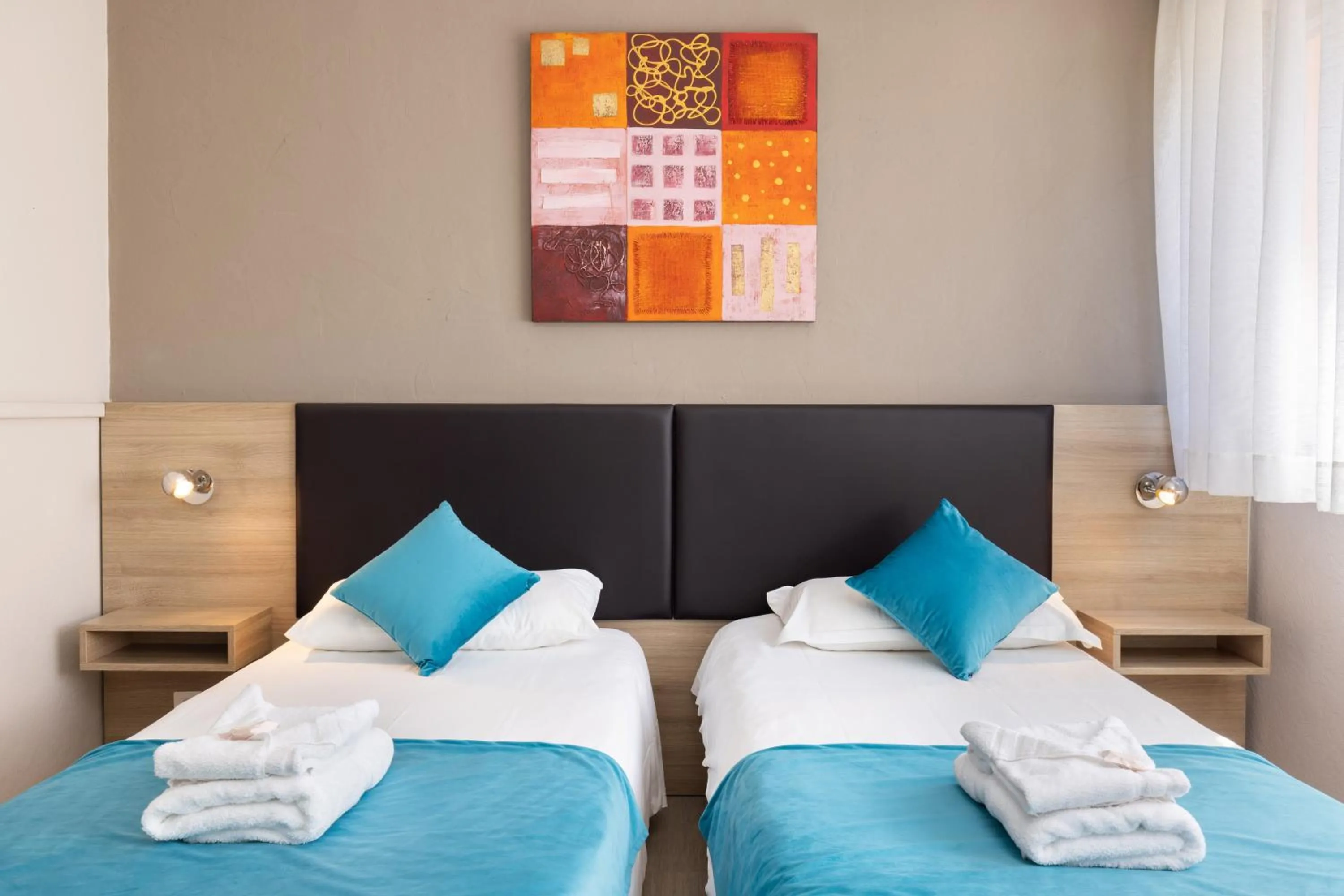 Property building, Bed in Hotel Club Le Capet