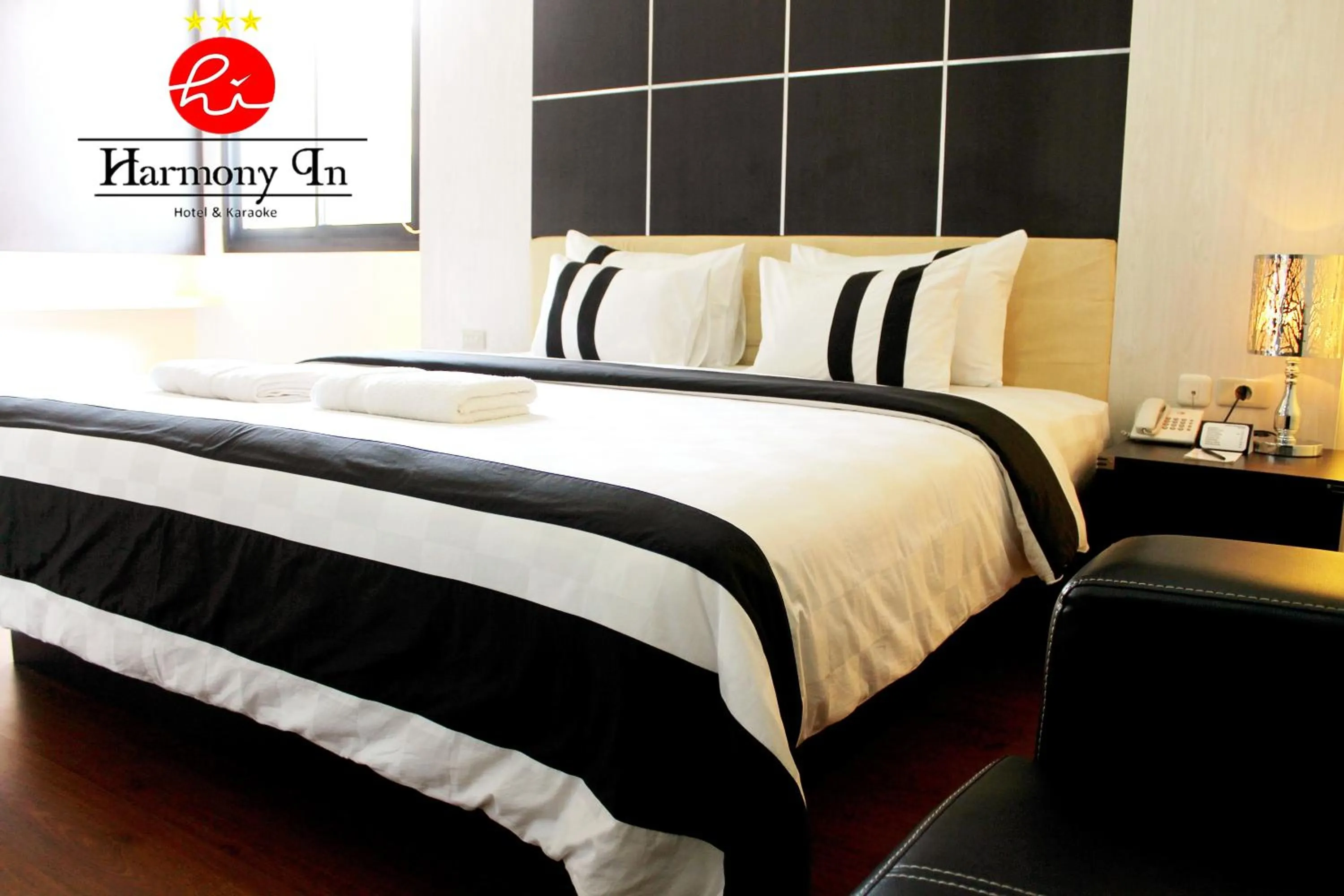 Bed in Hotel Harmony In & Karaoke