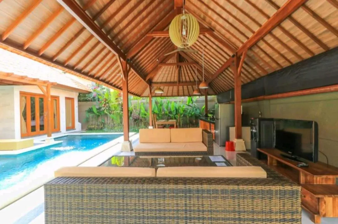 Communal lounge/ TV room in Three Brothers Bali Legian Bungalows & Villas