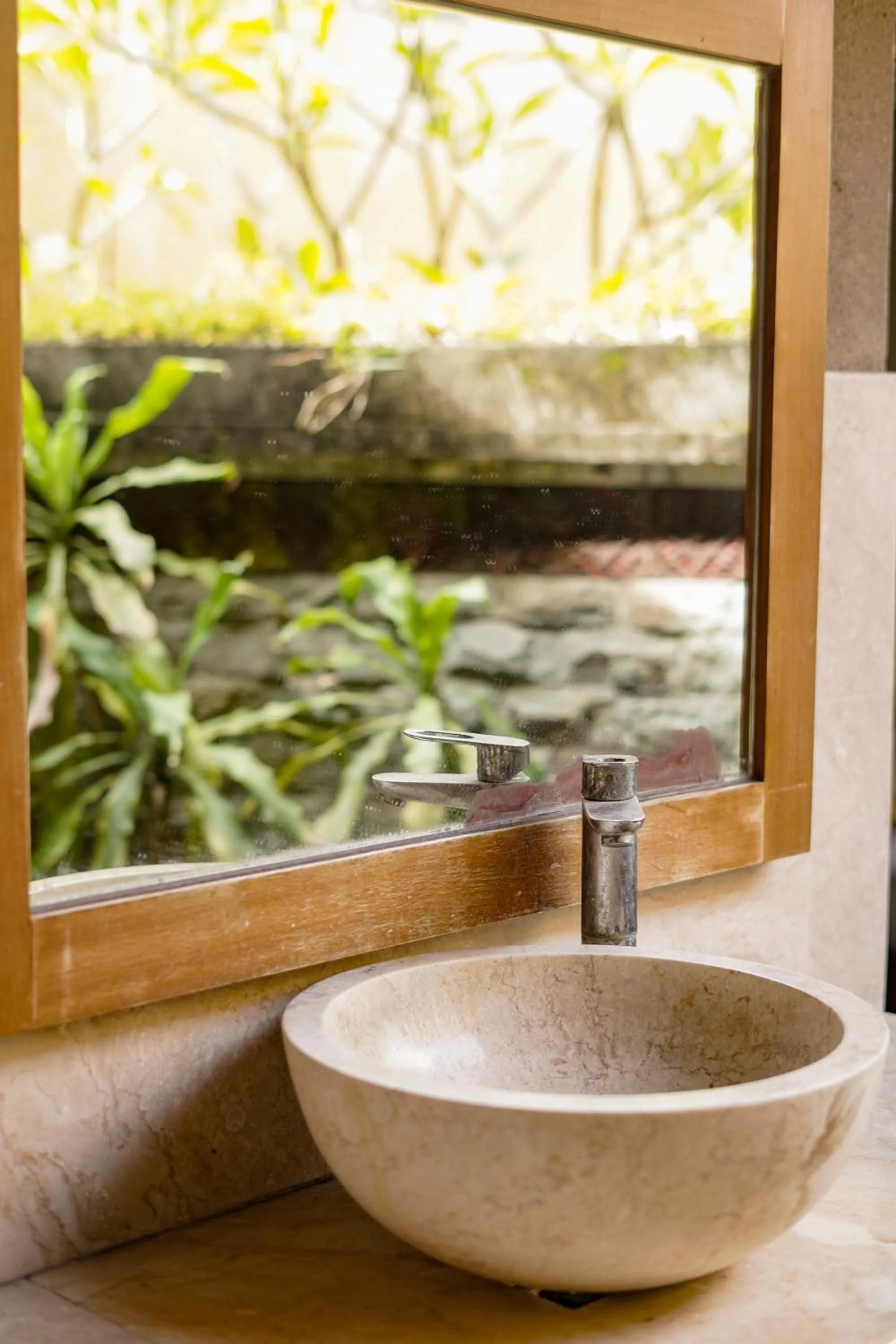 Bathroom in Three Brothers Bali Legian Bungalows & Villas