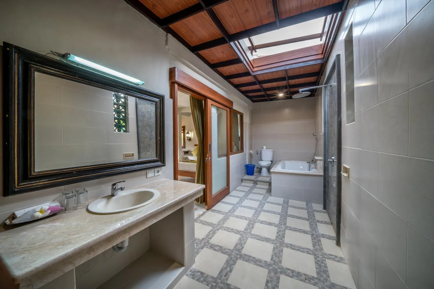 Bathroom in Three Brothers Bali Legian Bungalows & Villas