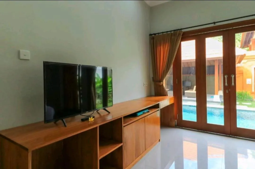 TV and multimedia in Three Brothers Bali Legian Bungalows & Villas