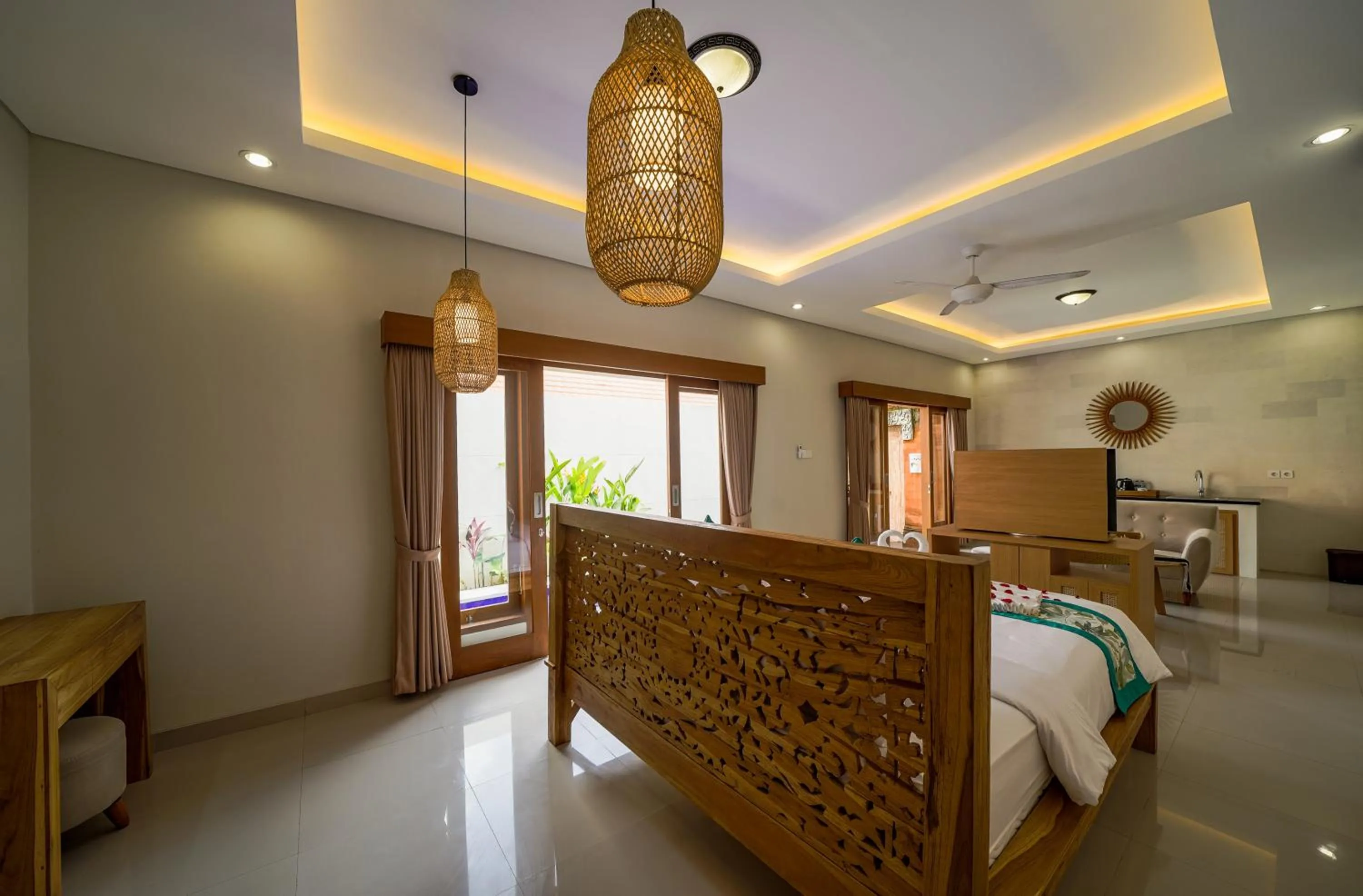 Bed in Three Brothers Bali Legian Bungalows & Villas