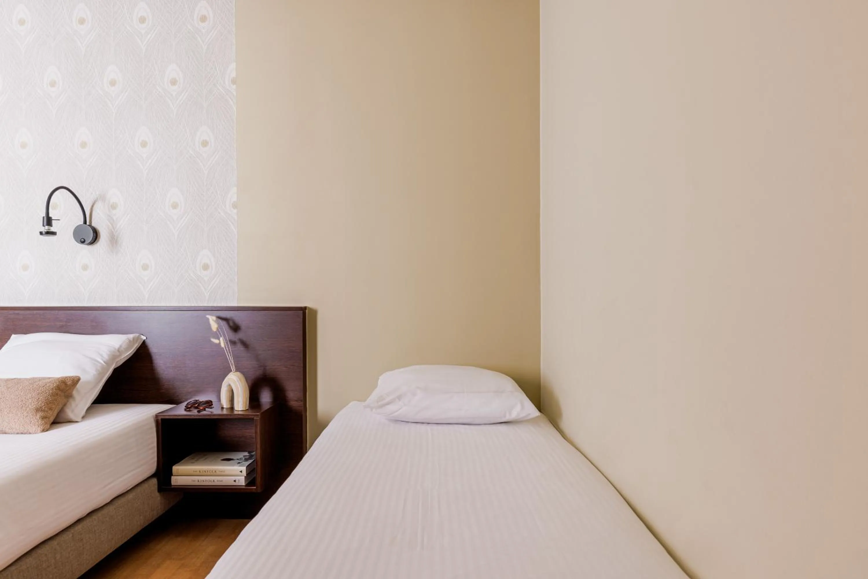 Bed in Hotel Corner House by WP Hotels