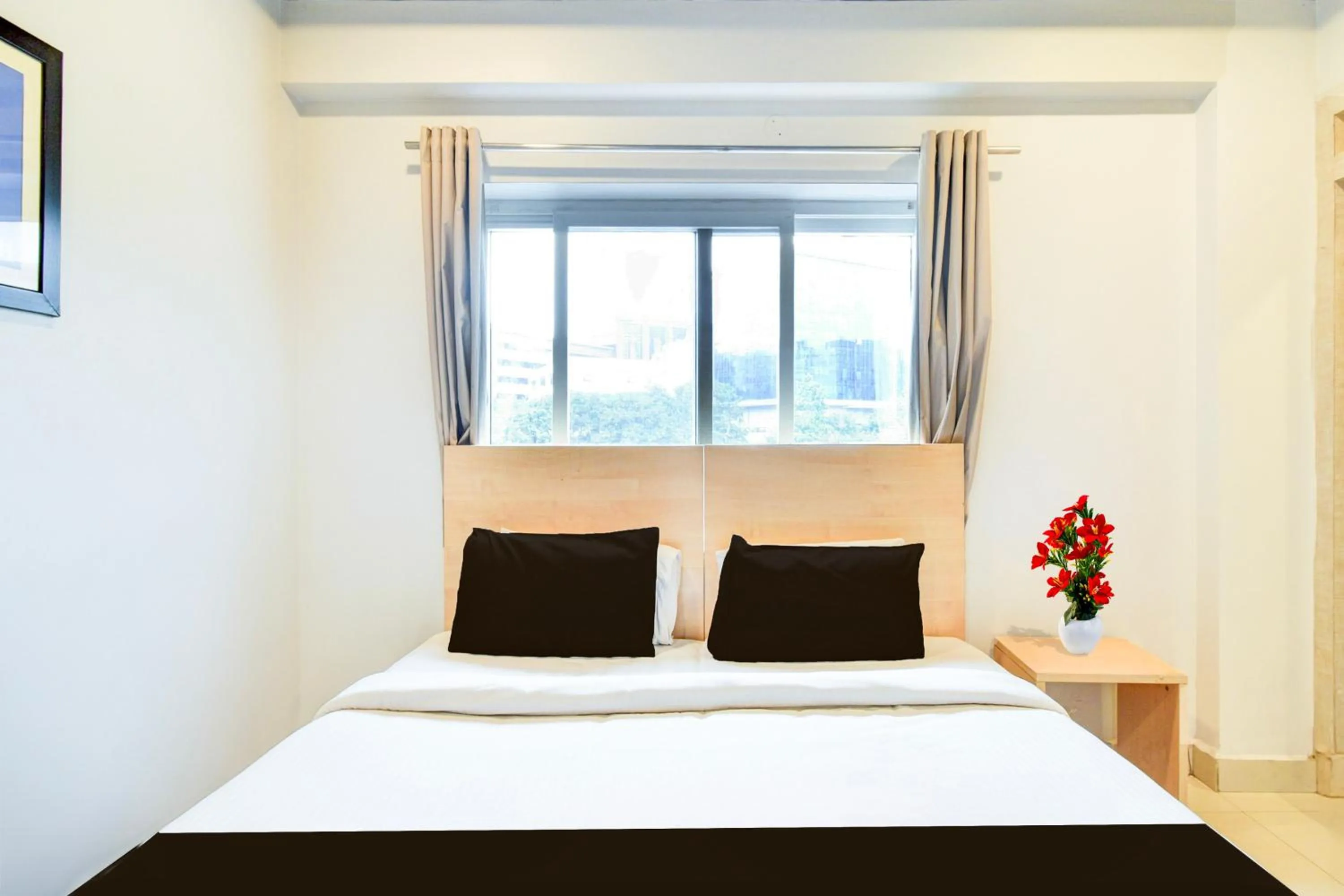 Bedroom, Bed in Super Townhouse HiTech city Hyderabad