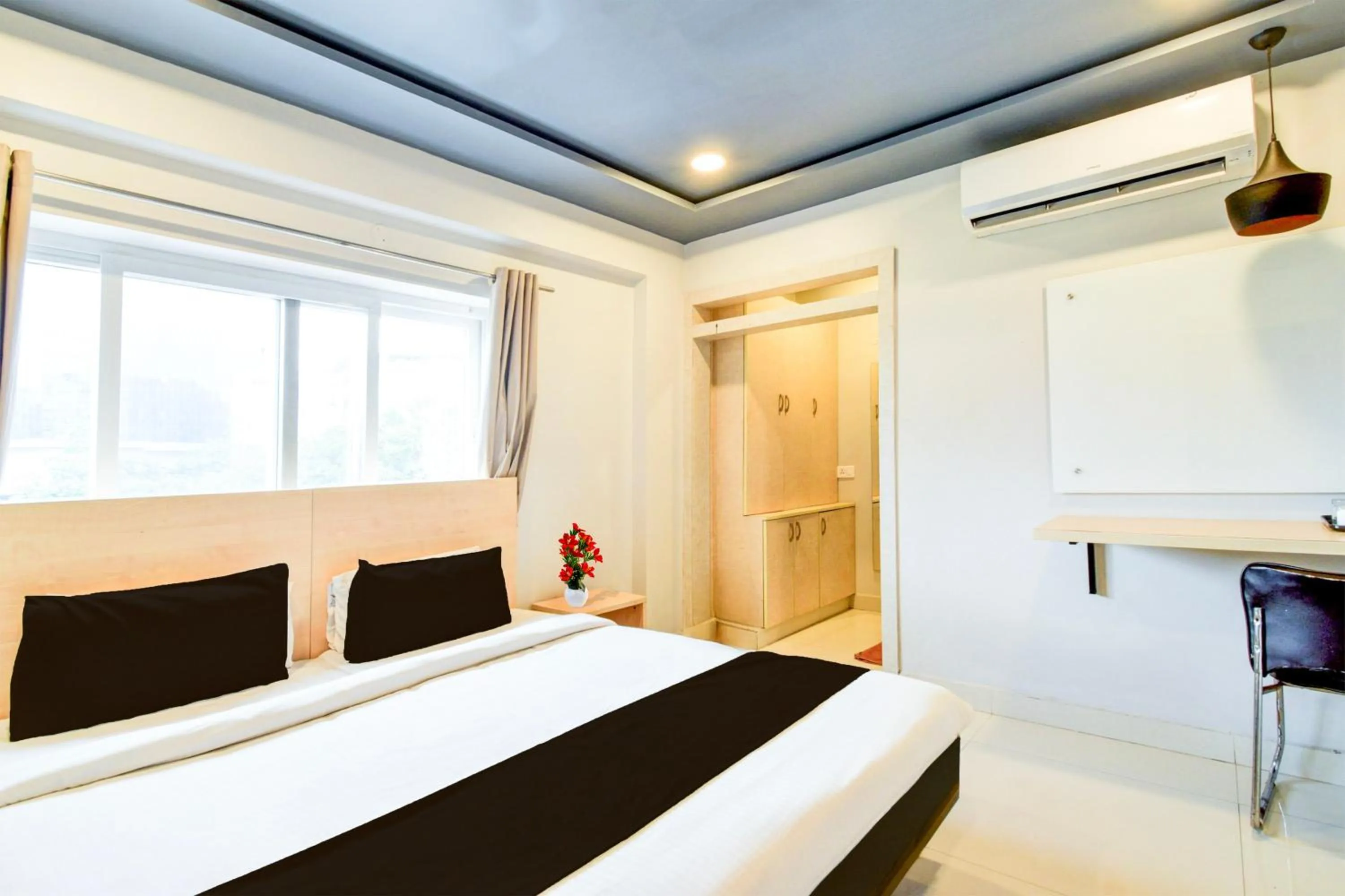 Bedroom, Bed in Super Townhouse HiTech city Hyderabad