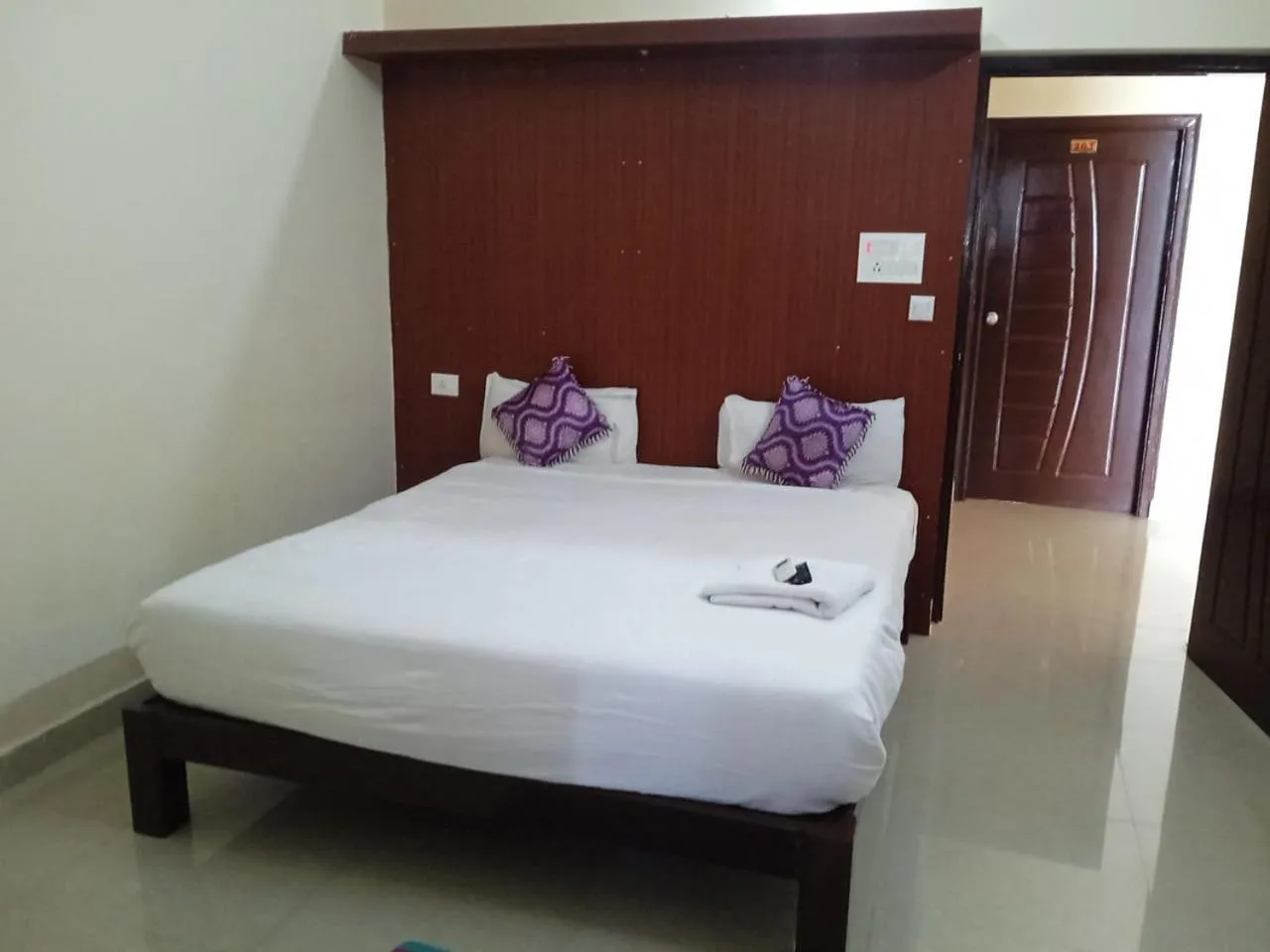 Bed in GRAND JP INN Near 2 km from Gundlupet bus stand