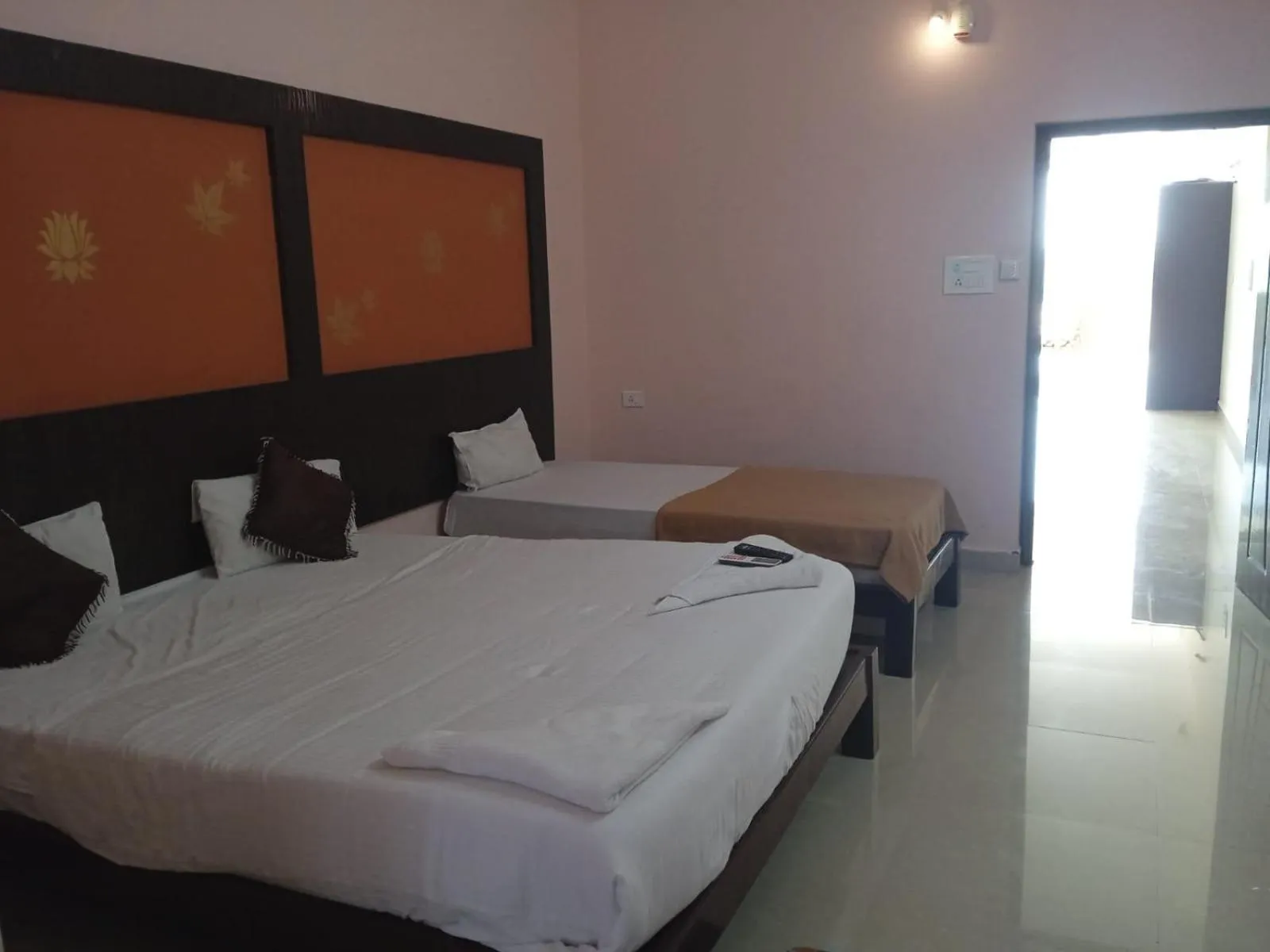 Photo of the whole room, Bed in GRAND JP INN Near 2 km from Gundlupet bus stand