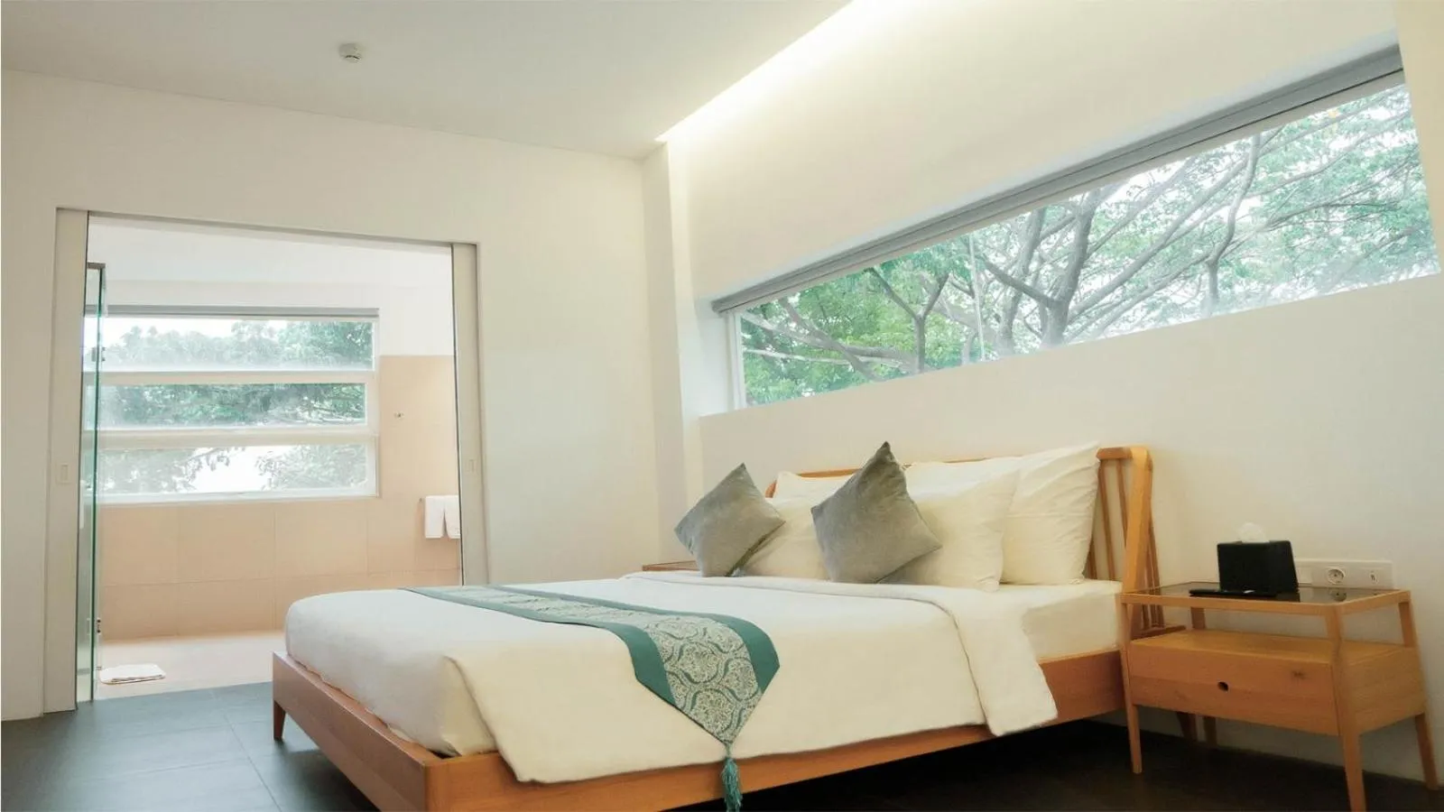 Bed in K Gallery Hotel