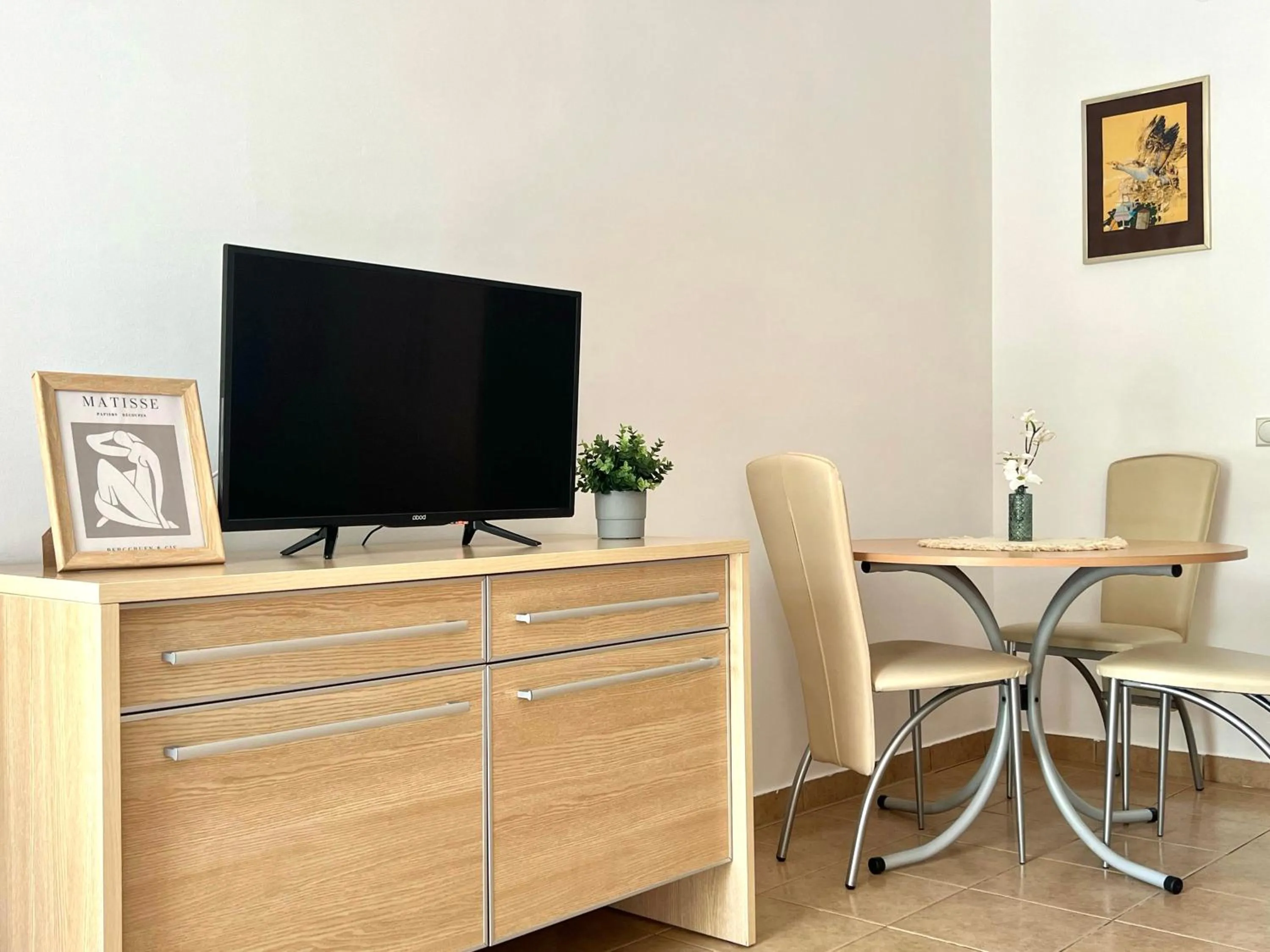 Communal lounge/ TV room in Villa Mila