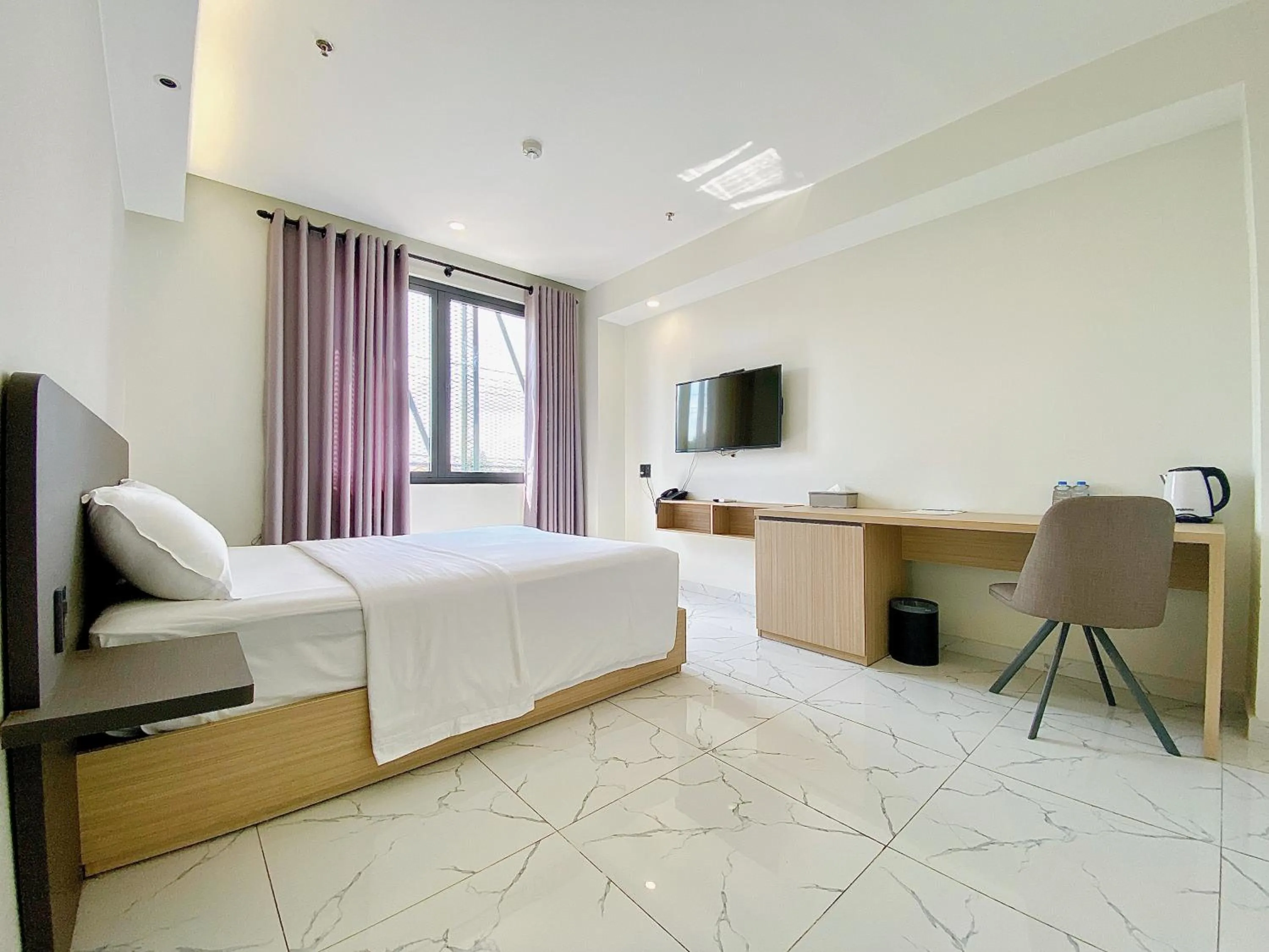 Bed in The Luxe Hotel Châu Đốc