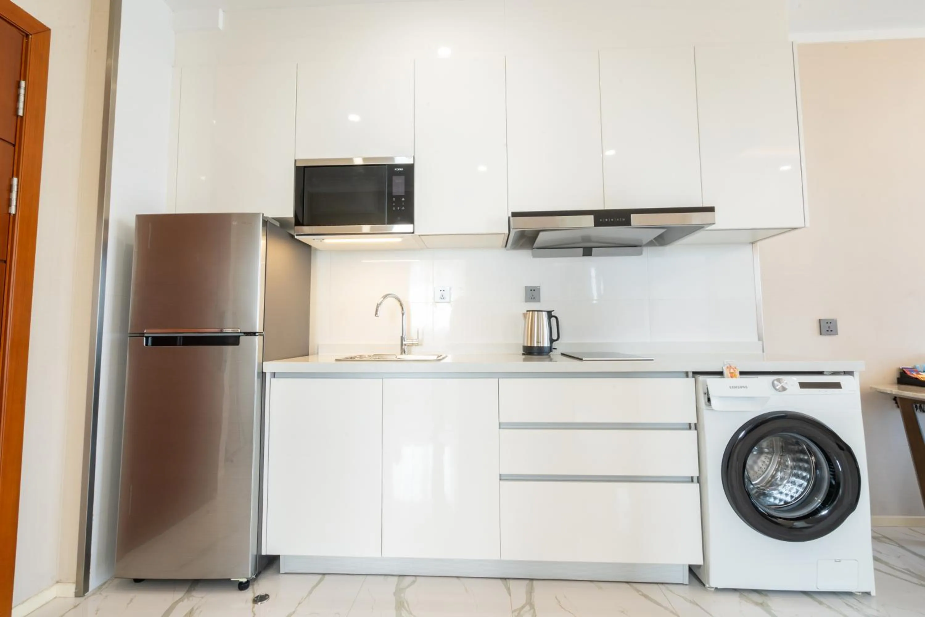 washing machine in One Park Hotel & Residence