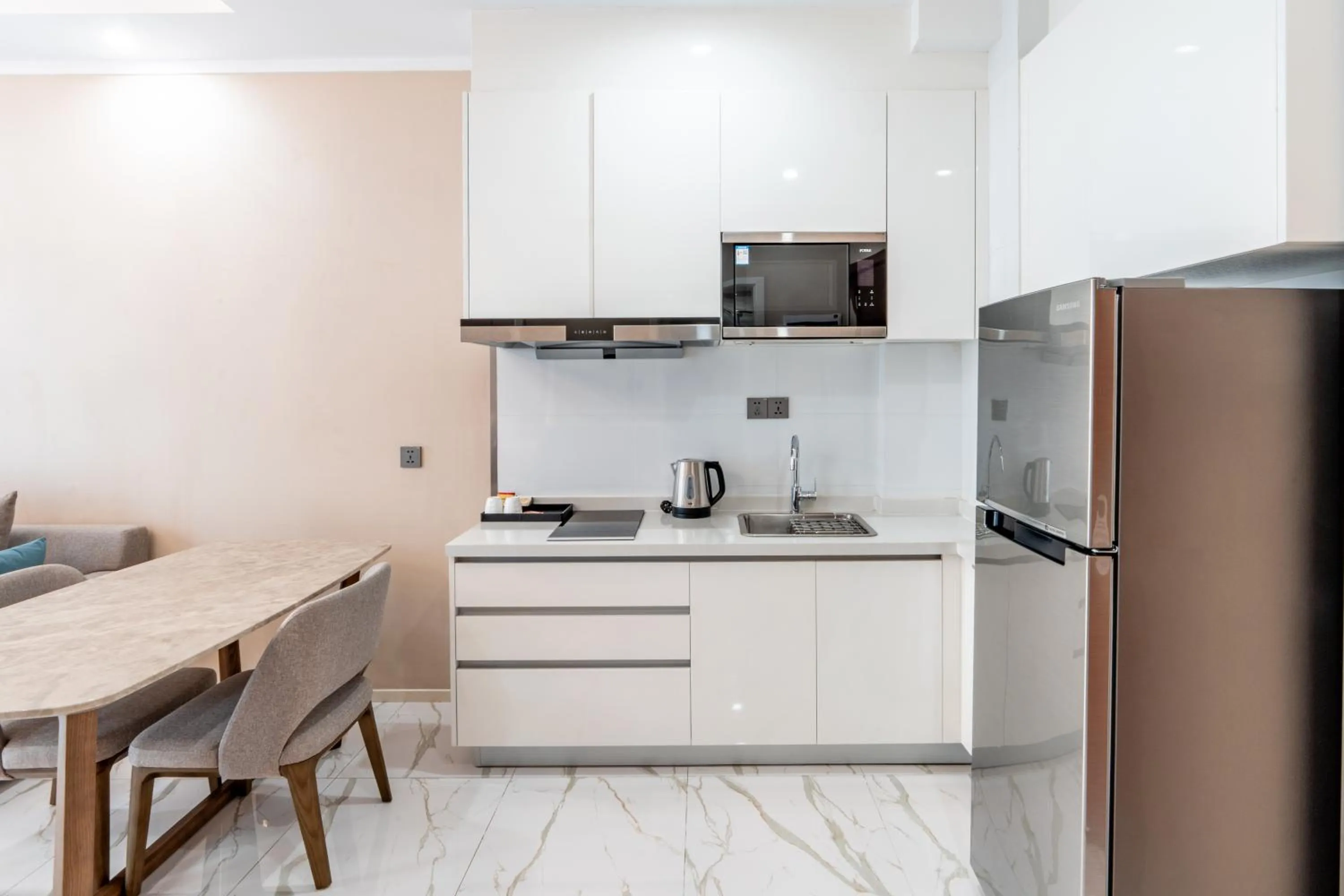 Kitchen or kitchenette in One Park Hotel & Residence