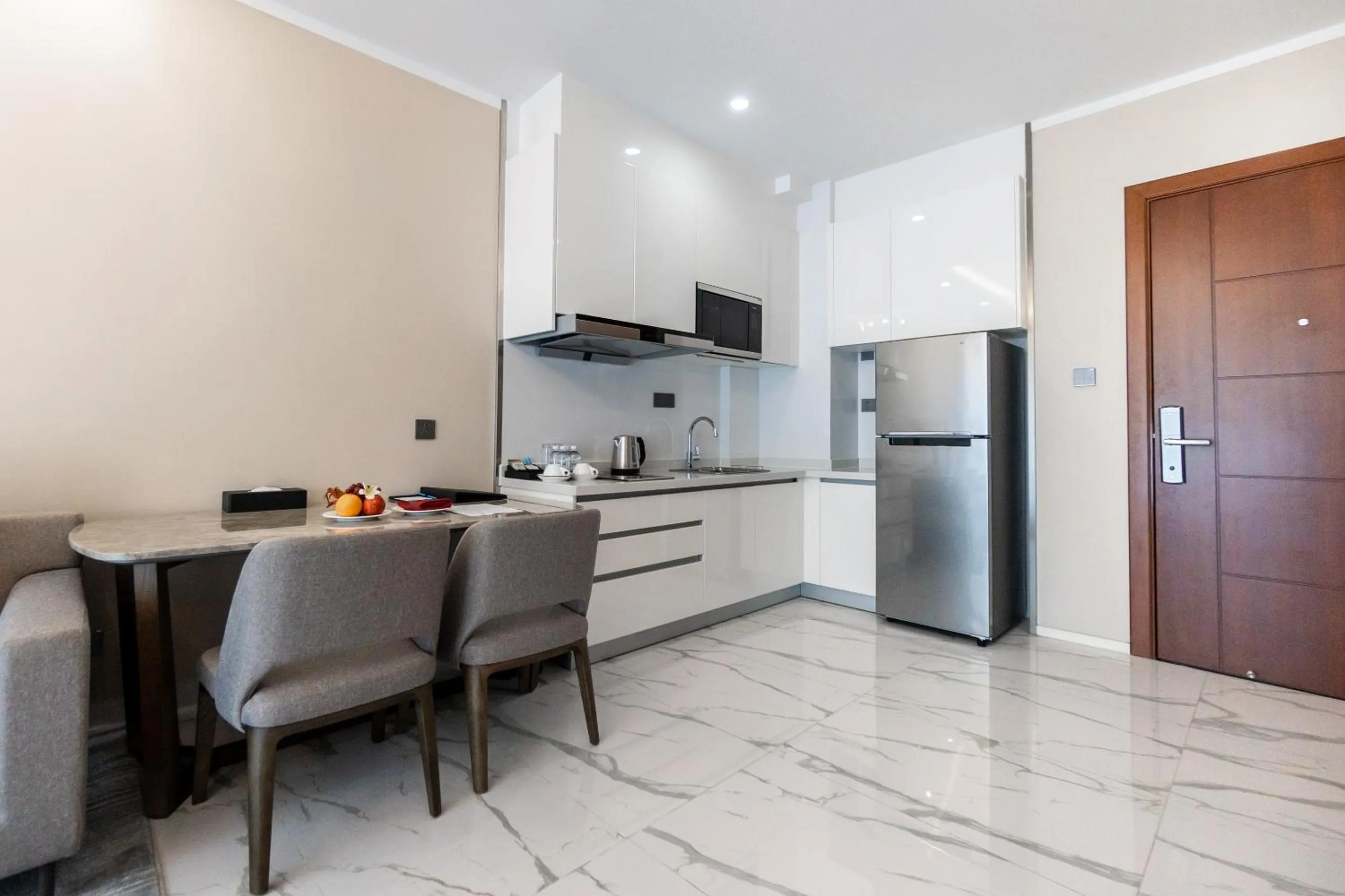 Kitchen or kitchenette in One Park Hotel & Residence