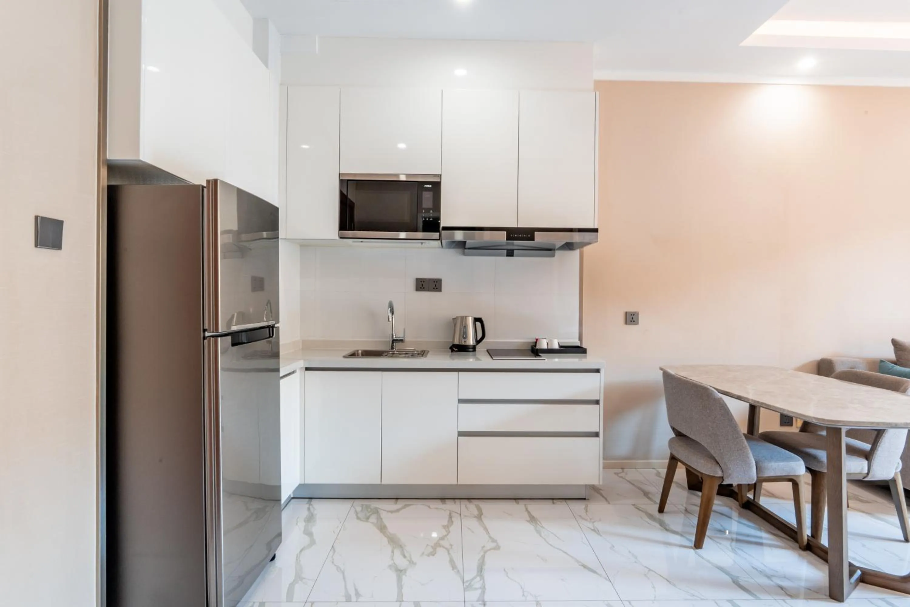 Kitchen or kitchenette in One Park Hotel & Residence