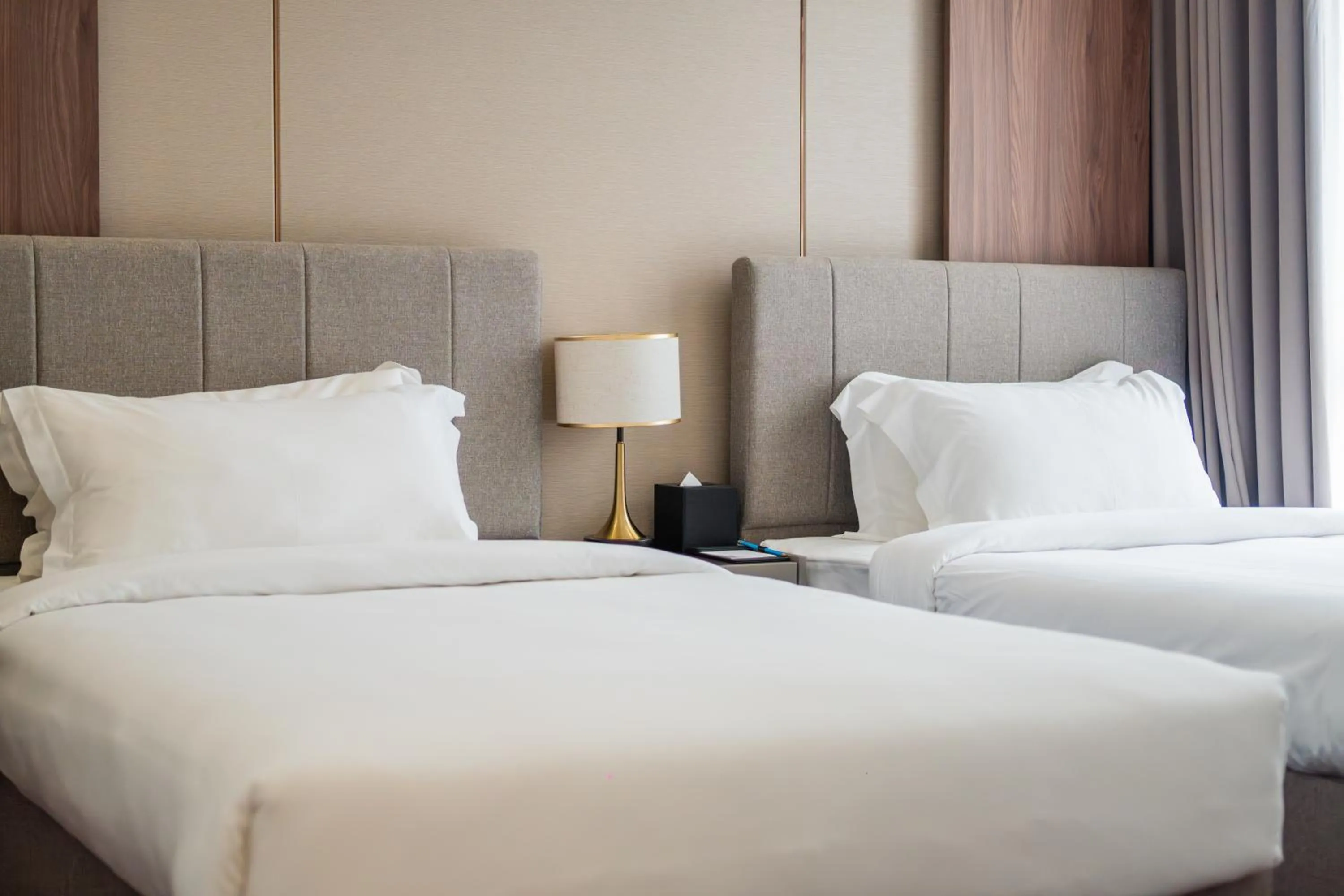 Bed in One Park Hotel & Residence