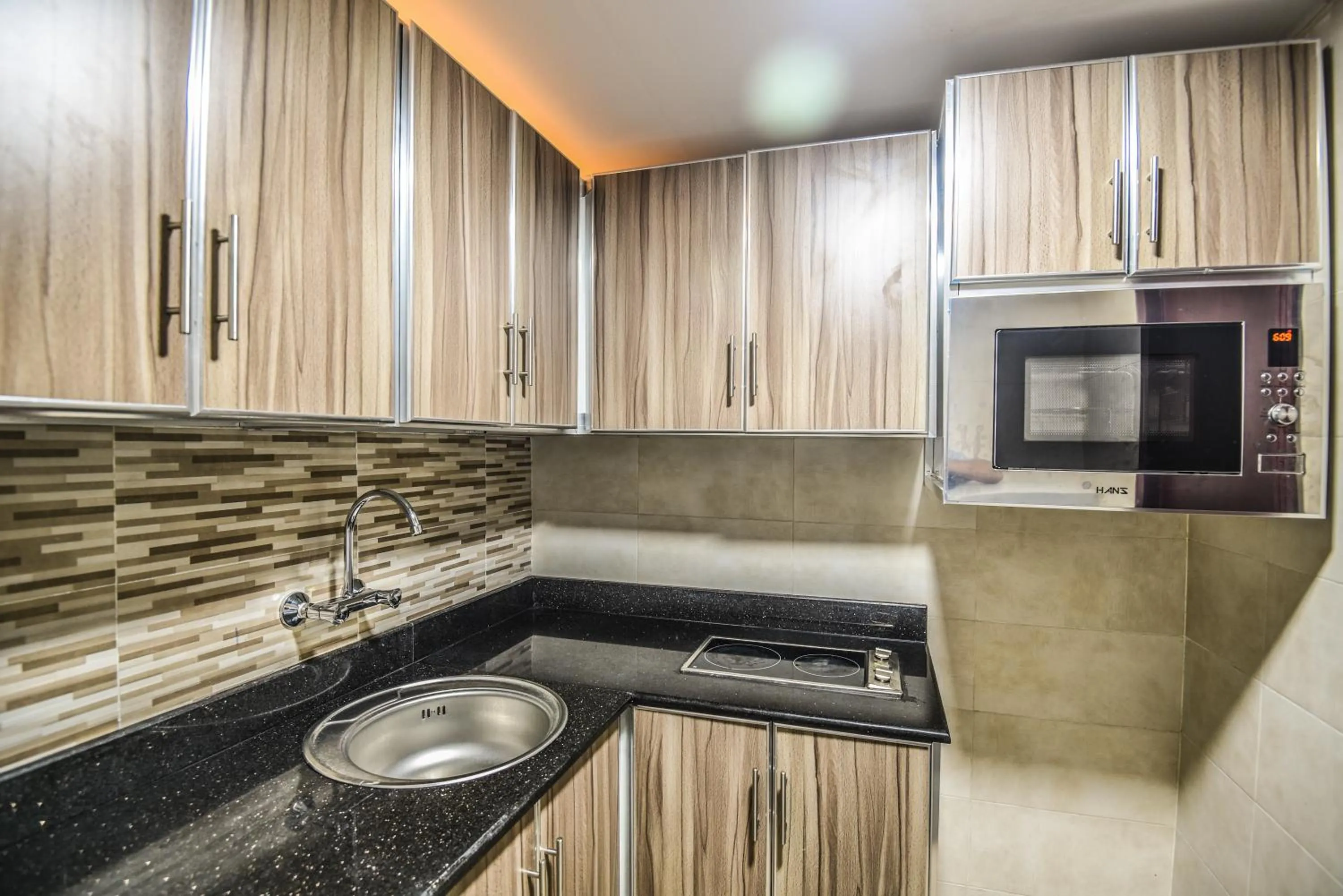 Kitchen or kitchenette in Grand Flora Hotel