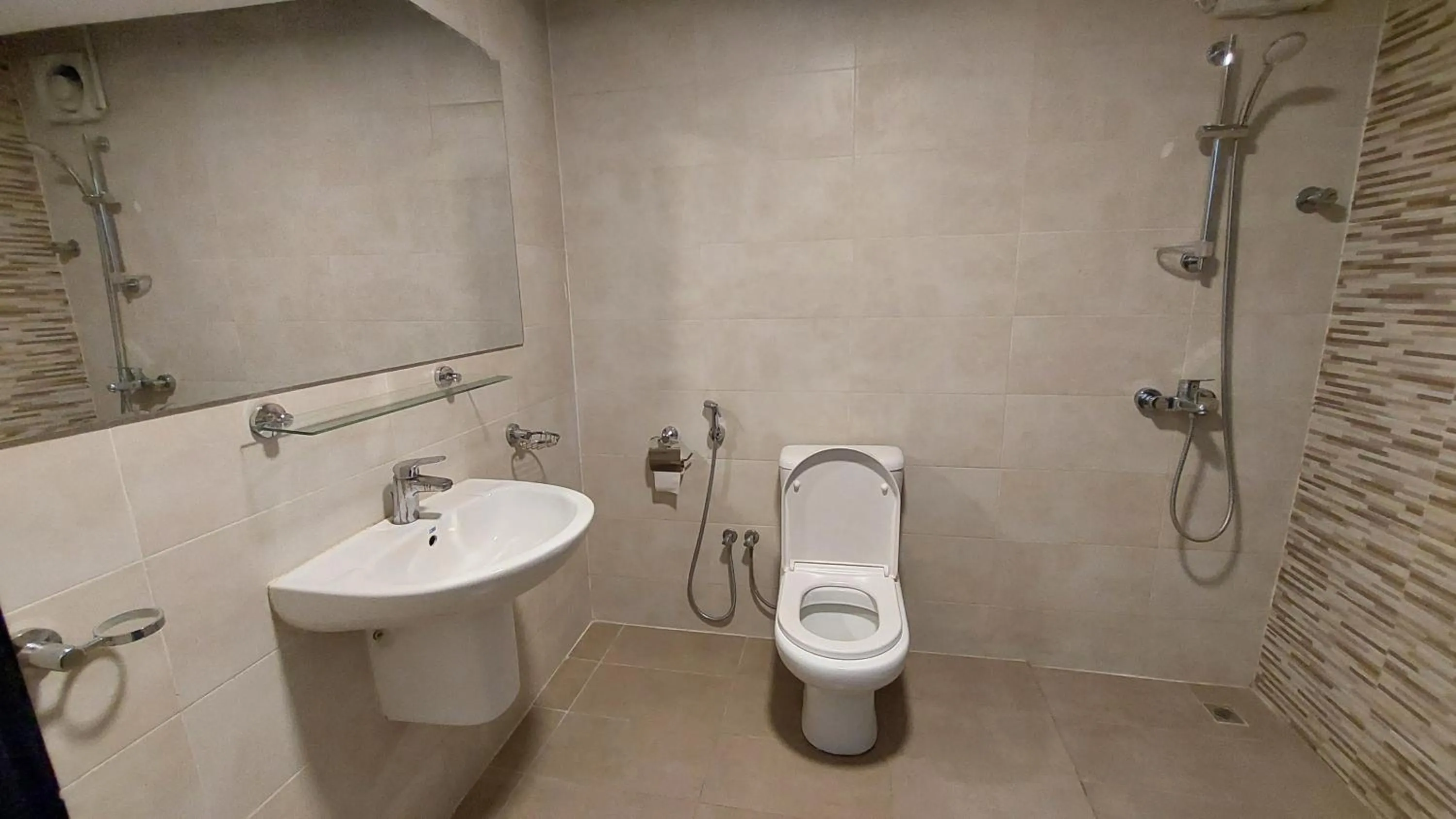 Toilet in Grand Flora Hotel