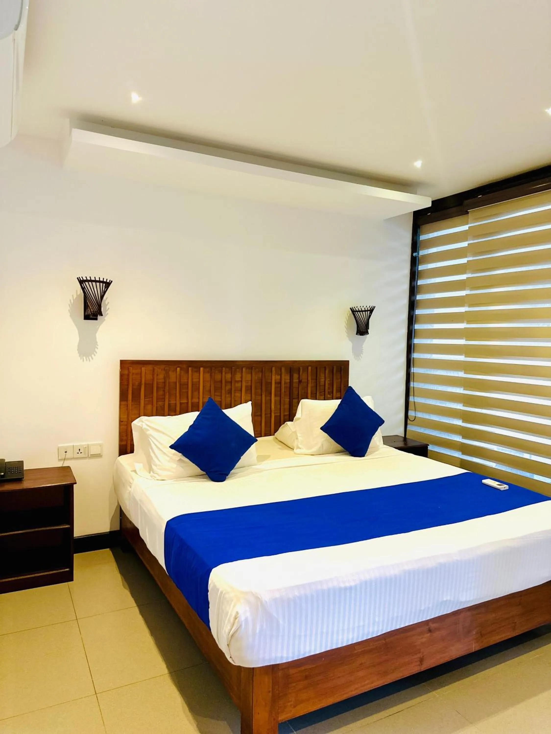 Bed in J7 Villaj Resort