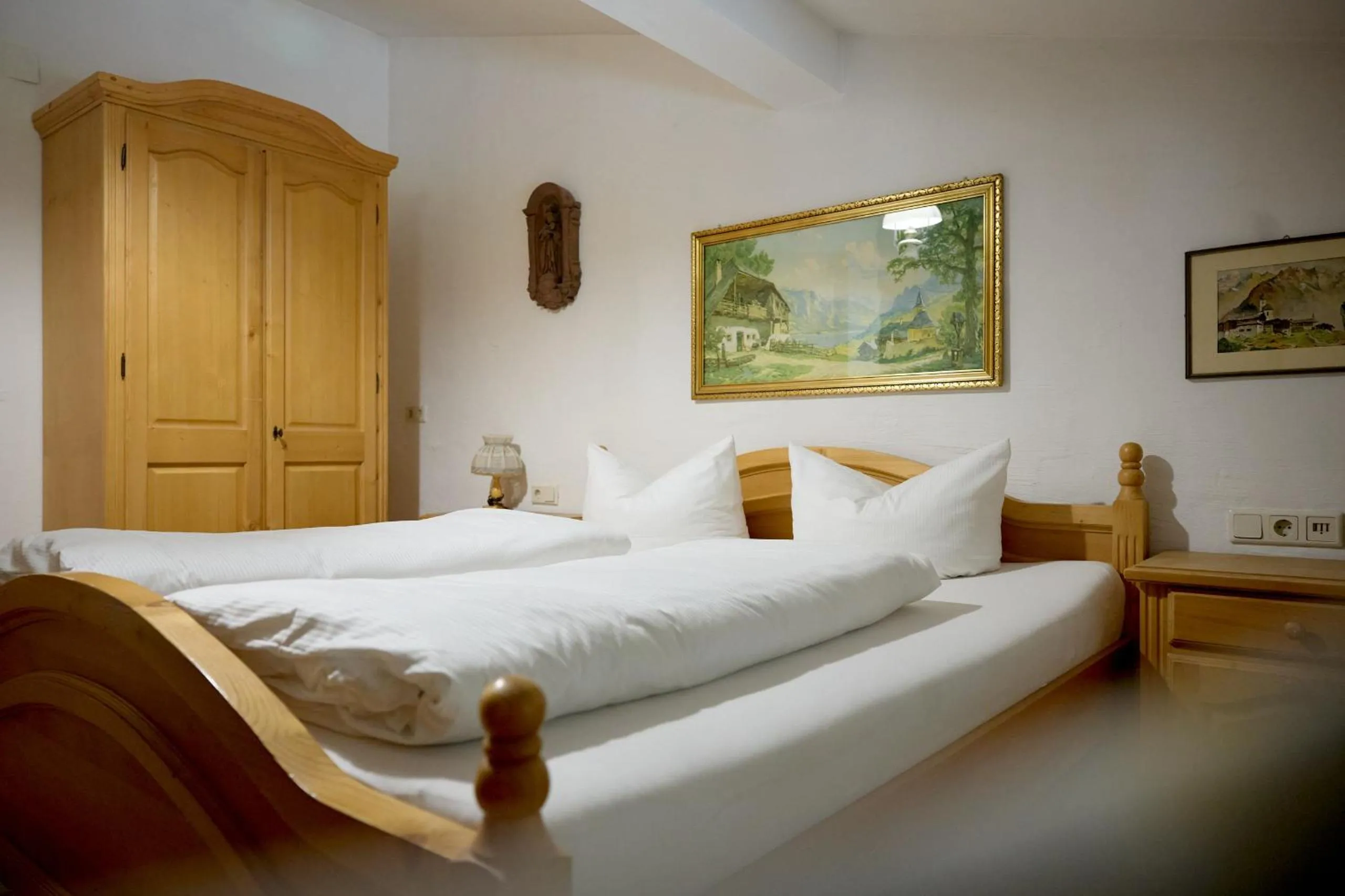 Bed in Alt Montafon Hotel Appartements by Pferd auf Wolke