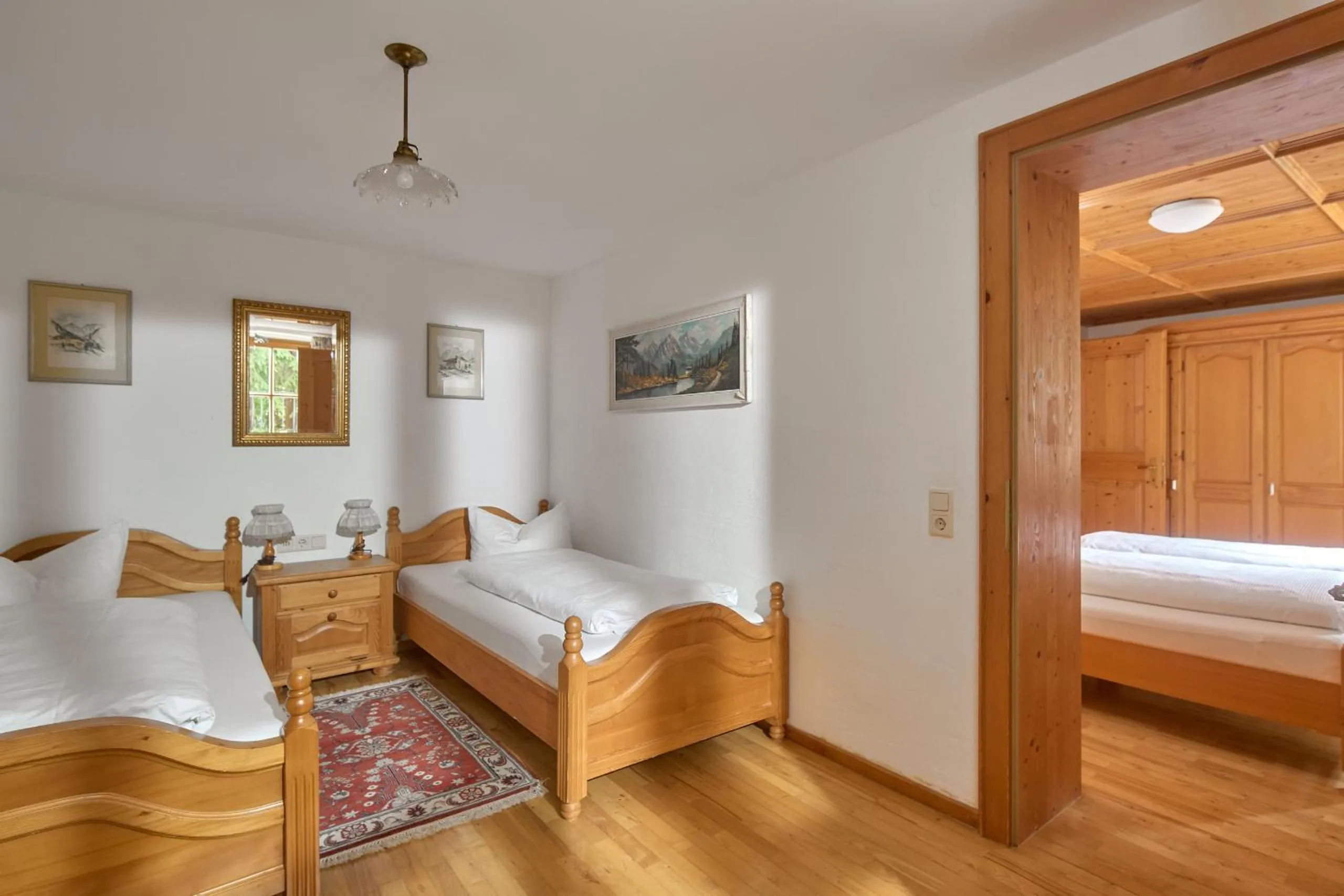 Bed in Alt Montafon Hotel Appartements by Pferd auf Wolke