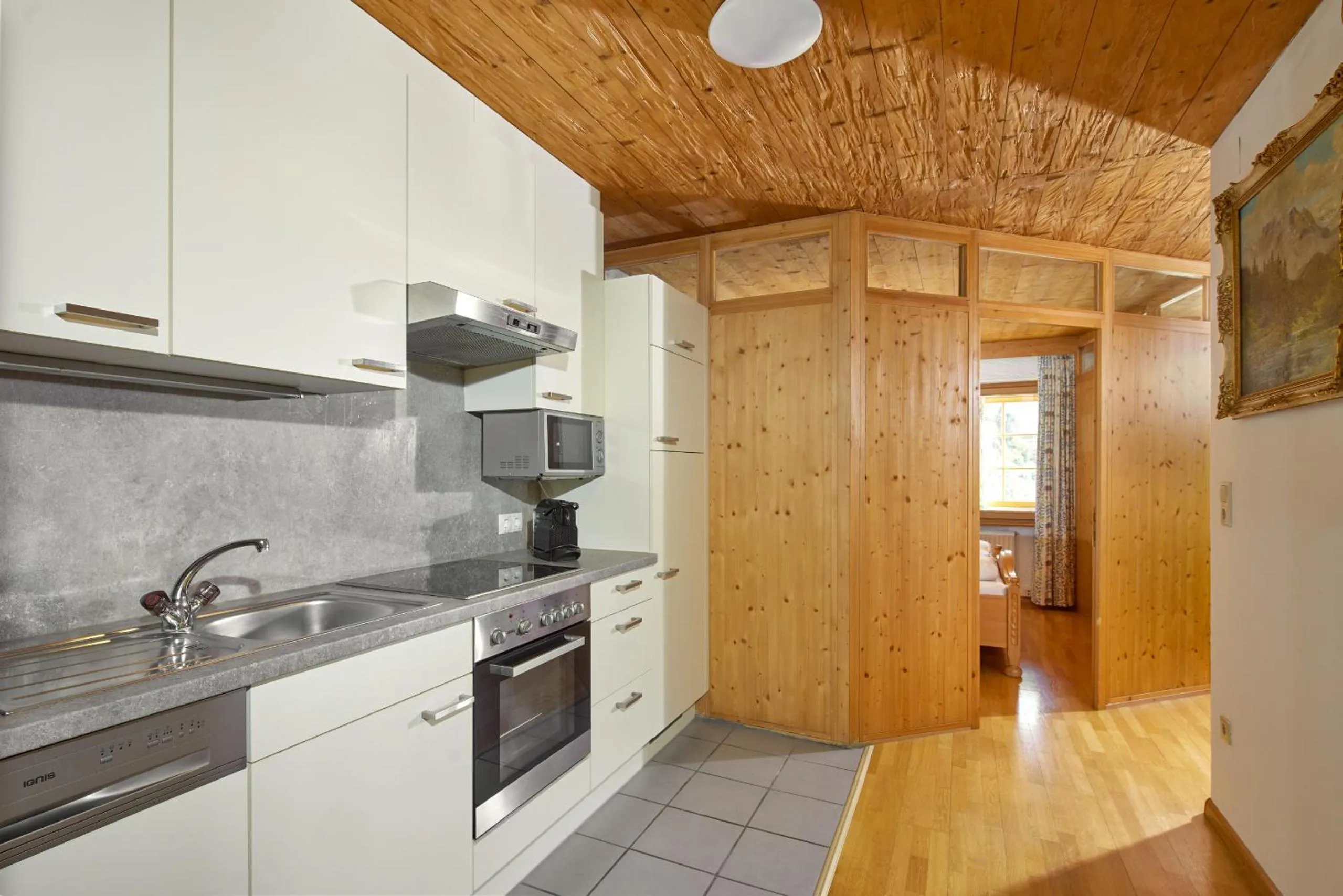 Kitchen or kitchenette in Alt Montafon Hotel Appartements by Pferd auf Wolke