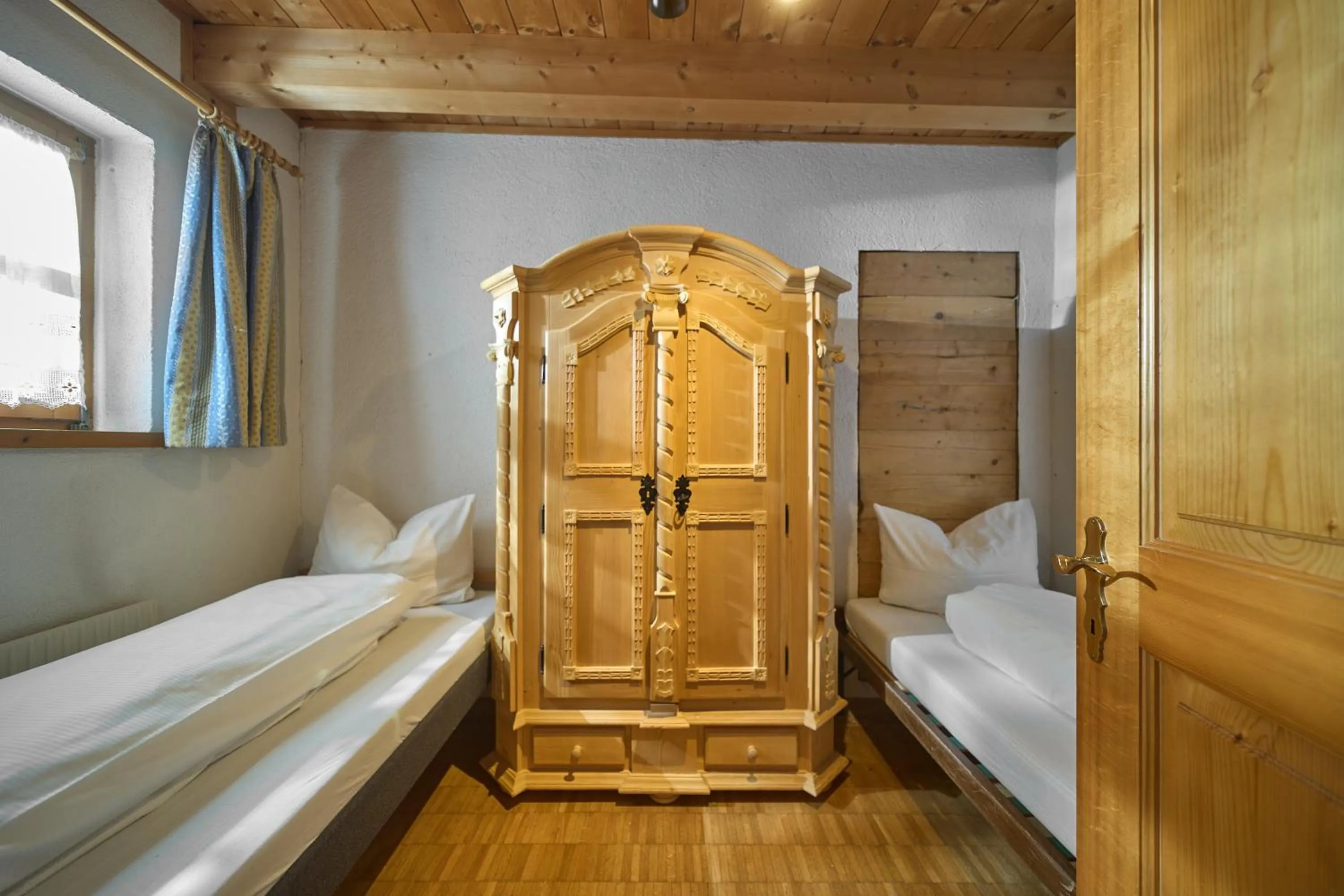 Bed in Alt Montafon Hotel Appartements by Pferd auf Wolke